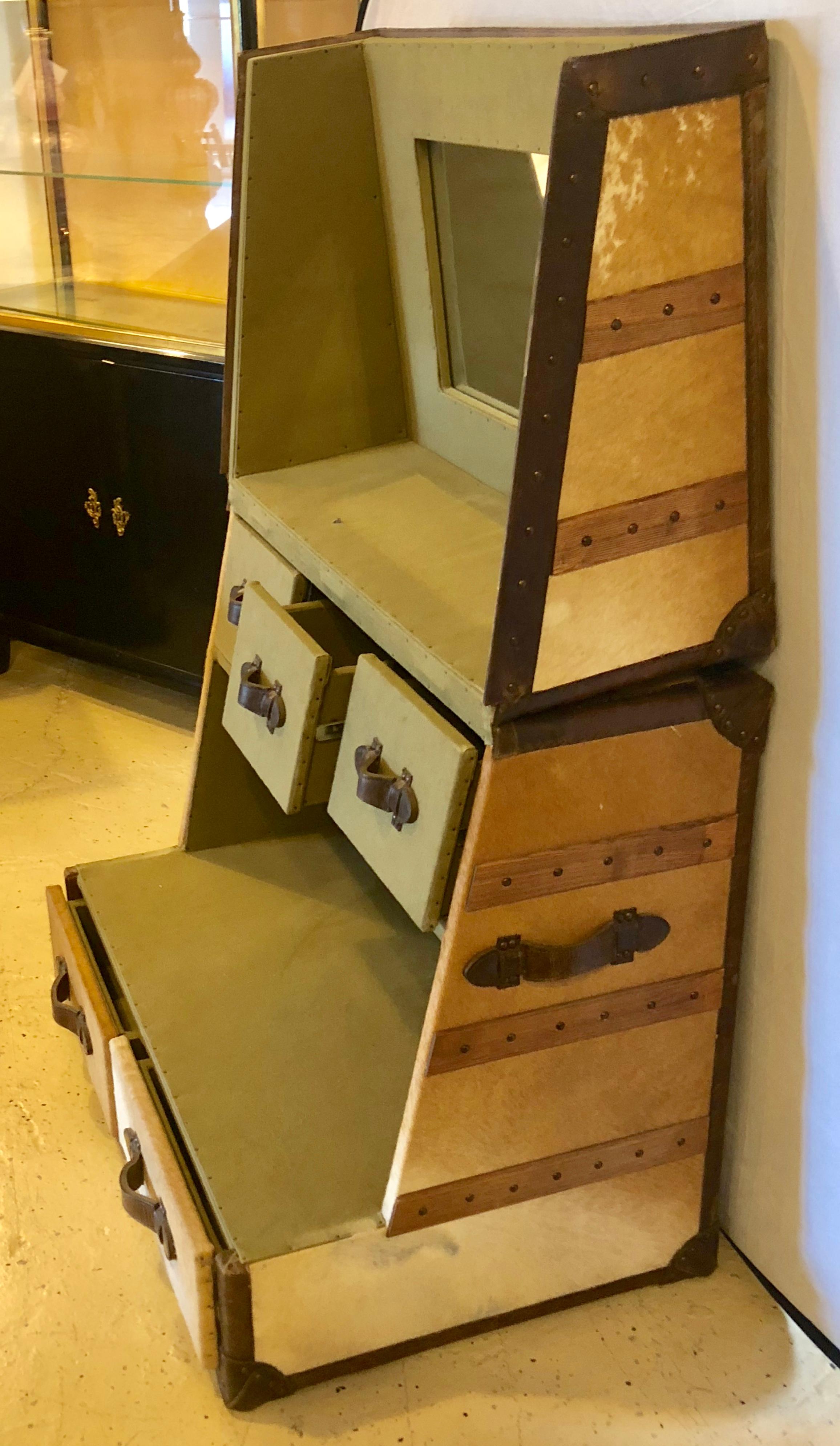 One of a Kind Faux pony hide decorated and leather trimmed collapsible vanity table trunk or chest. This finished interior and exterior chest having all leather side straps and leather drawer pulls.