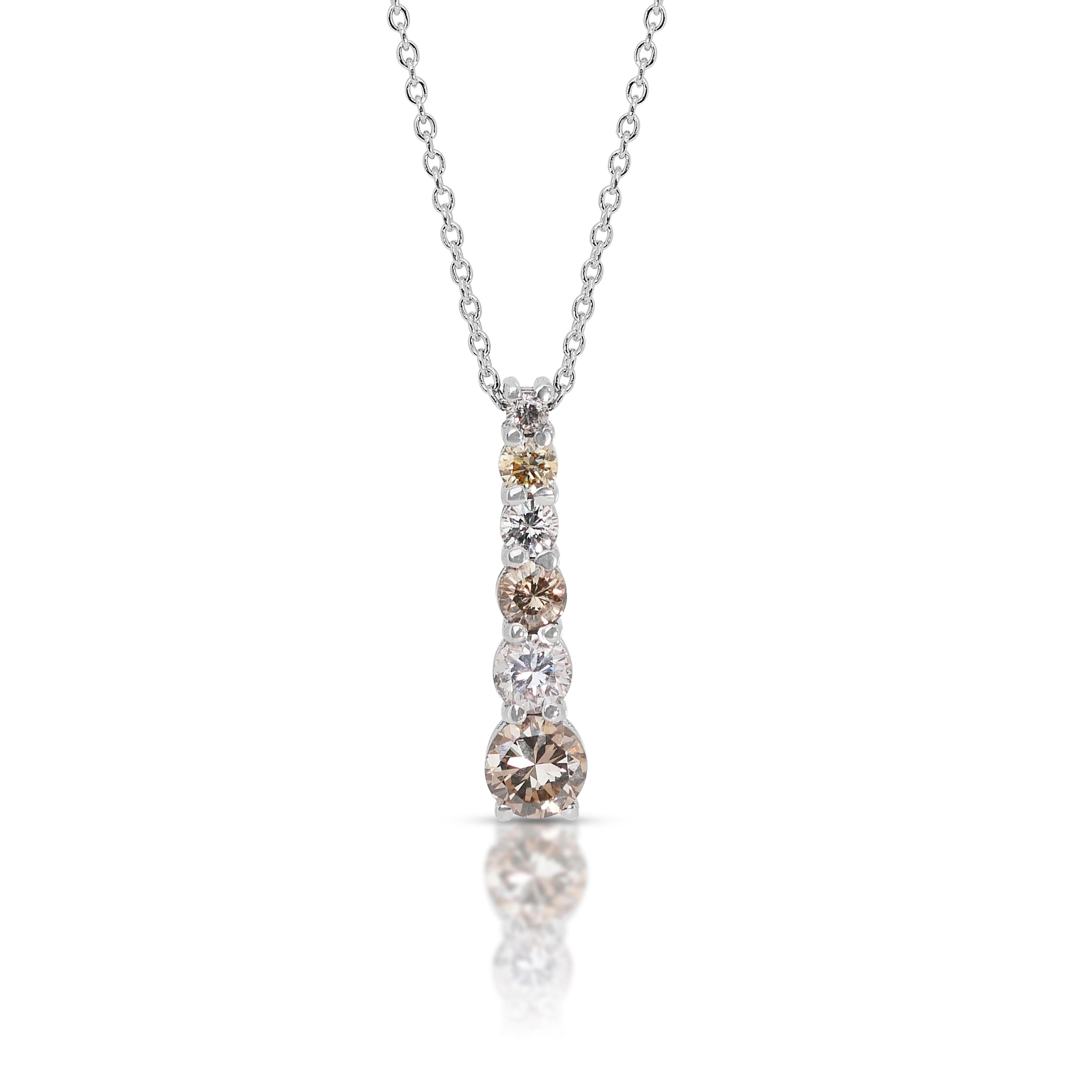 One of a Kind Radiant 18k White Gold Fancy Colored Diamond Necklace w/1.09 ct - IGI Certified

This exquisite 18k white gold fancy-colored diamond necklace showcases a sophisticated blend of elegance and color, making it a perfect choice for those