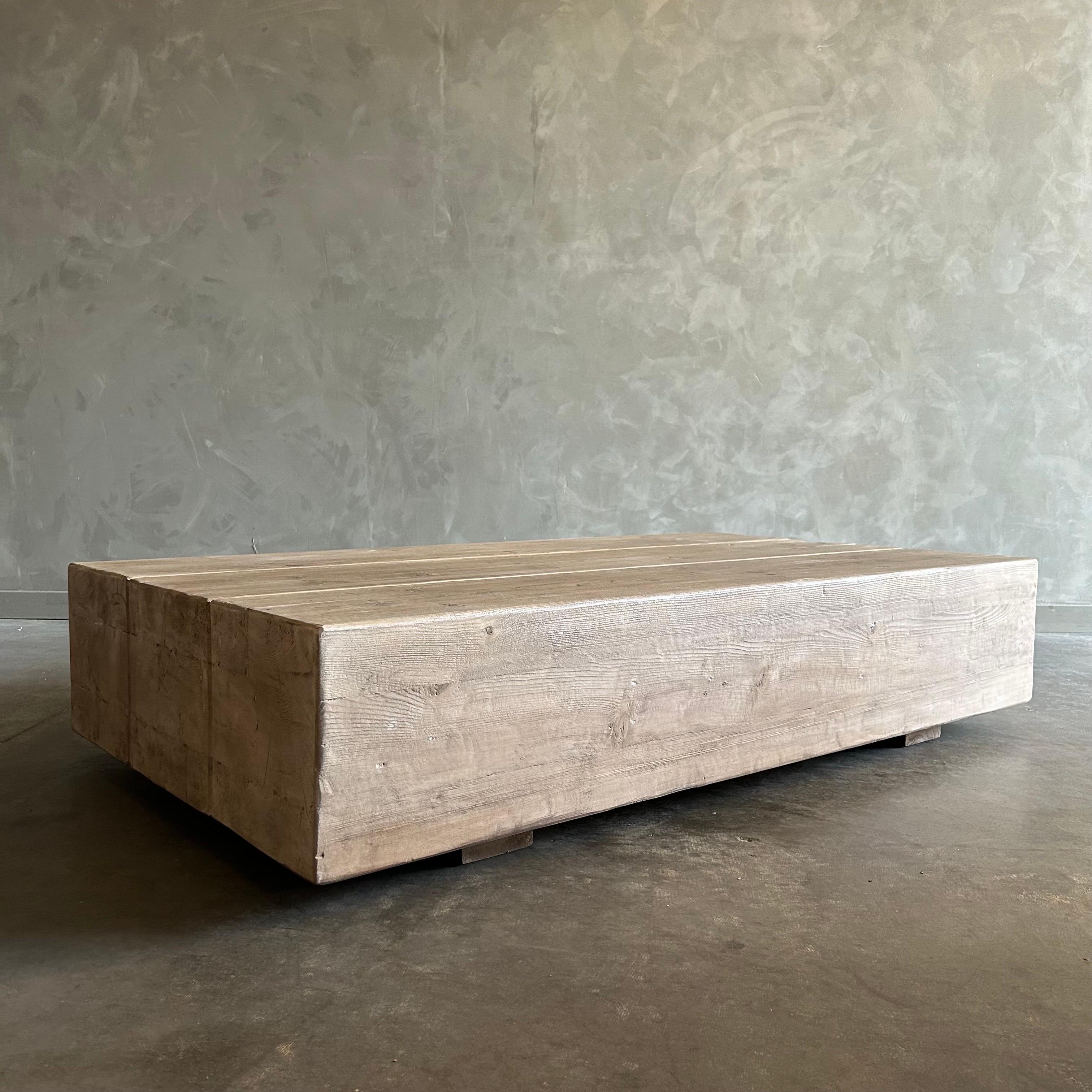BH COLLECTION
One of a kind Elm Wood Beam Coffee Table
This table is a modern minimalist's dream, it is an elegant piece that will grow with you throughout time. Made of elm wood planks, the table's finish highlights the natural grain and beauty of