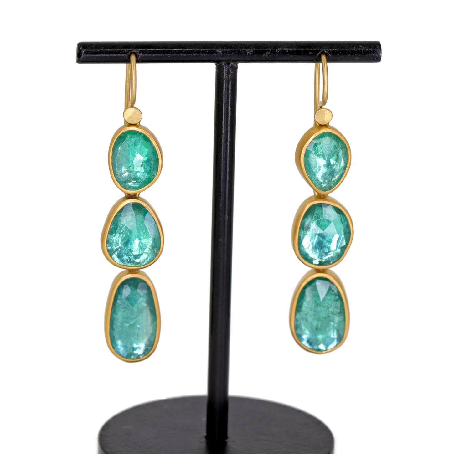 One of a Kind Triple Drop Earrings by award-winning jewelry maker Lola Brooks, hand-fabricated in her signature-finished 22k yellow gold featuring six shimmering rose-cut emeralds totaling 9.18 carats, each bezel-set and finished with Lola's