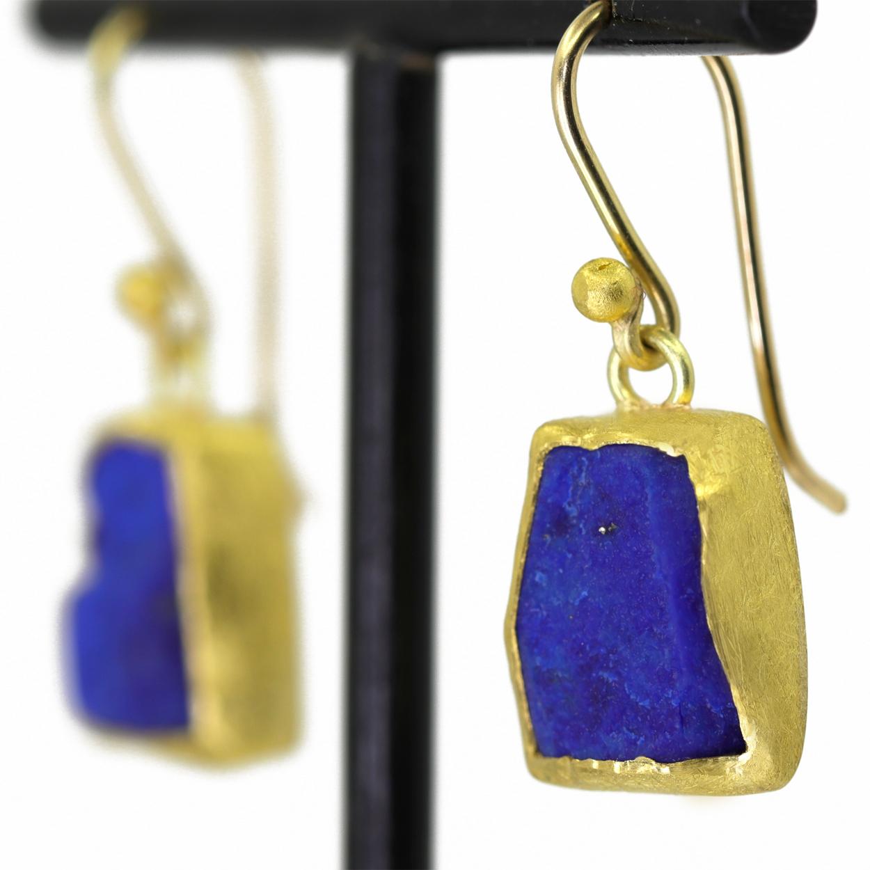 One of a Kind Rough Lapis Lazuli Drop Earrings handmade by acclaimed jewelry artist Petra Class showcasing a beautiful set of matched rough royal blue lapis lazuli, individually set in solid 22k yellow gold with the makers signature finish, and