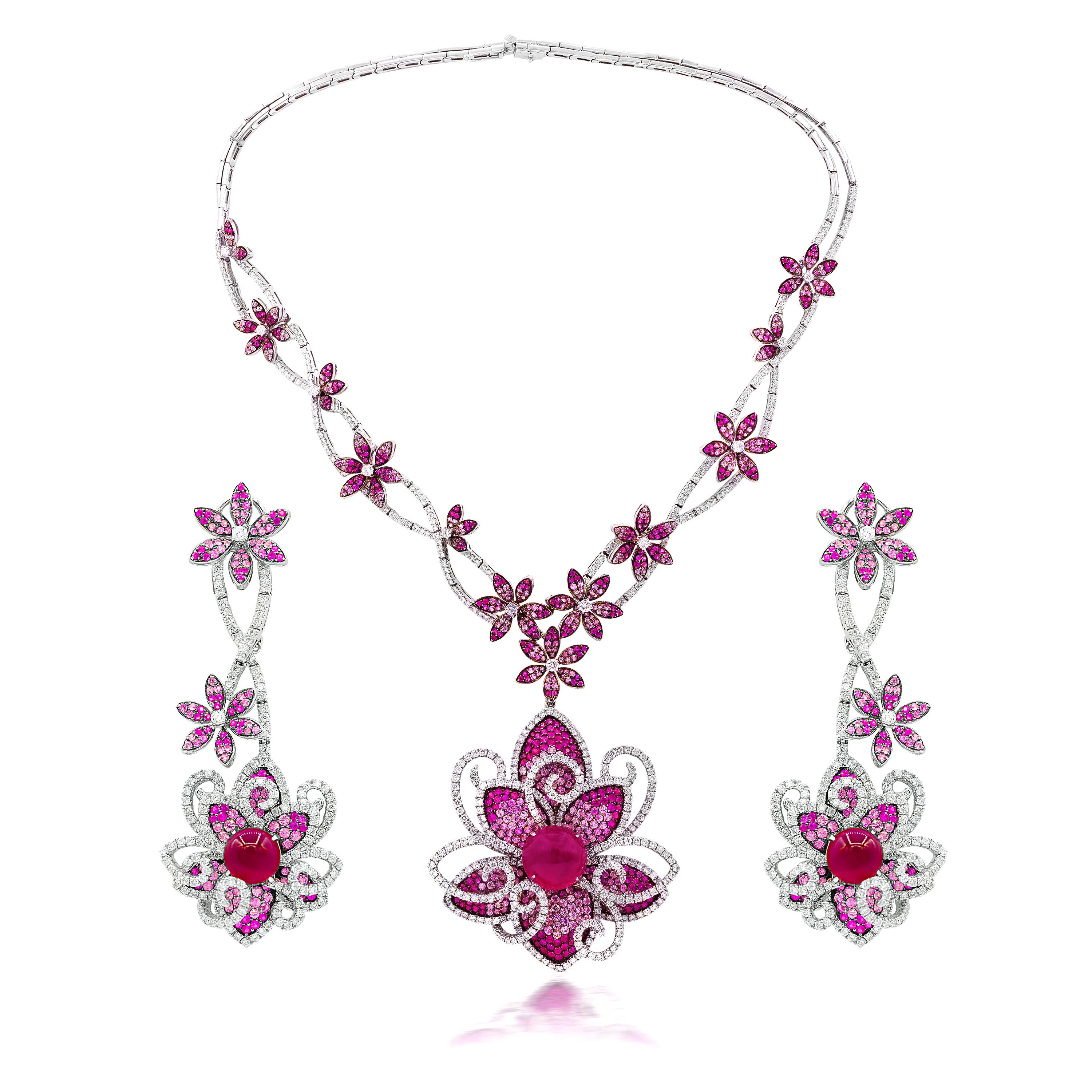 One of a kind Rubellite, Sapphire and Diamond Necklace, features 33.10 Carats of Rubellite and Pink Sapphires, mixed with 11.50 Carats of round brilliant cut diamonds. 
*Earrings sold separately. 
