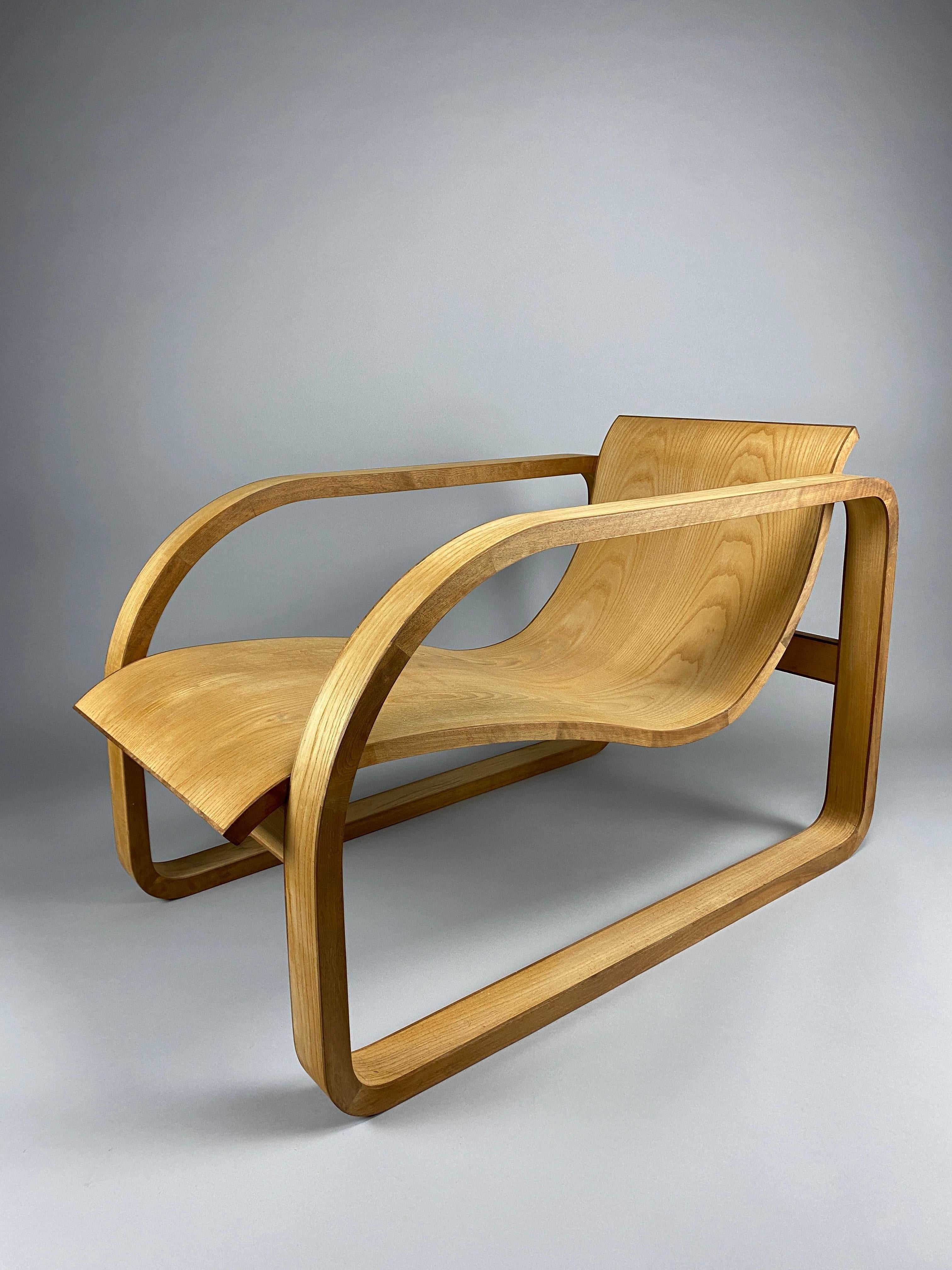 Introducing a Work of Art: The 1990's Lounge Chair

Elevate your space with a true masterpiece of design - the one-of-a-kind 1990's lounge chair. This extraordinary piece transcends the boundaries of furniture, captivating the eye with its exquisite