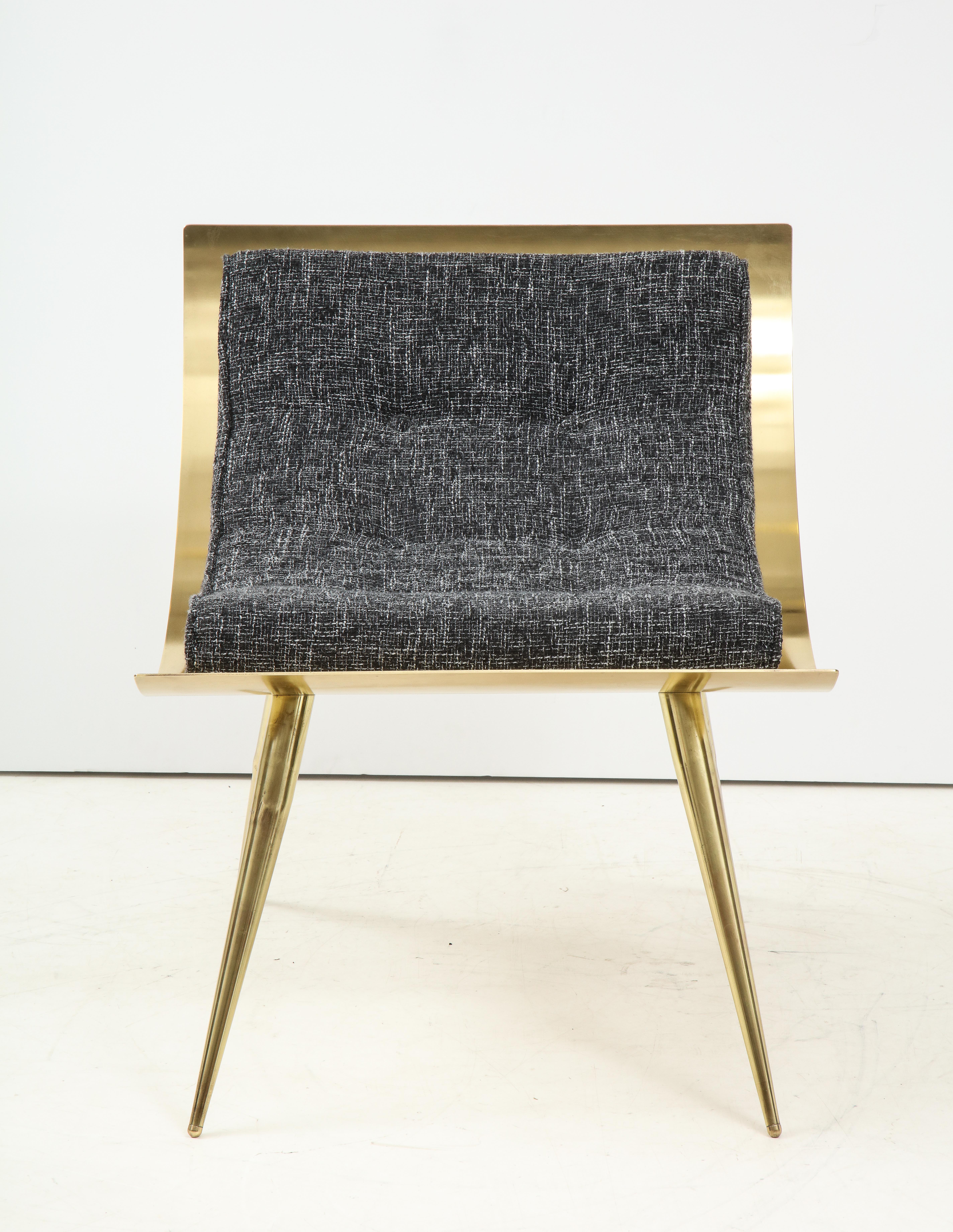 One of a kind sculptural solid brass accent chair with Italian grey woven wool tweed upholstery. Curved Brass back is polished and lacquered with a warm patina. Straight brass legs with brass cross bars for support. Upholstered in an imported, grey