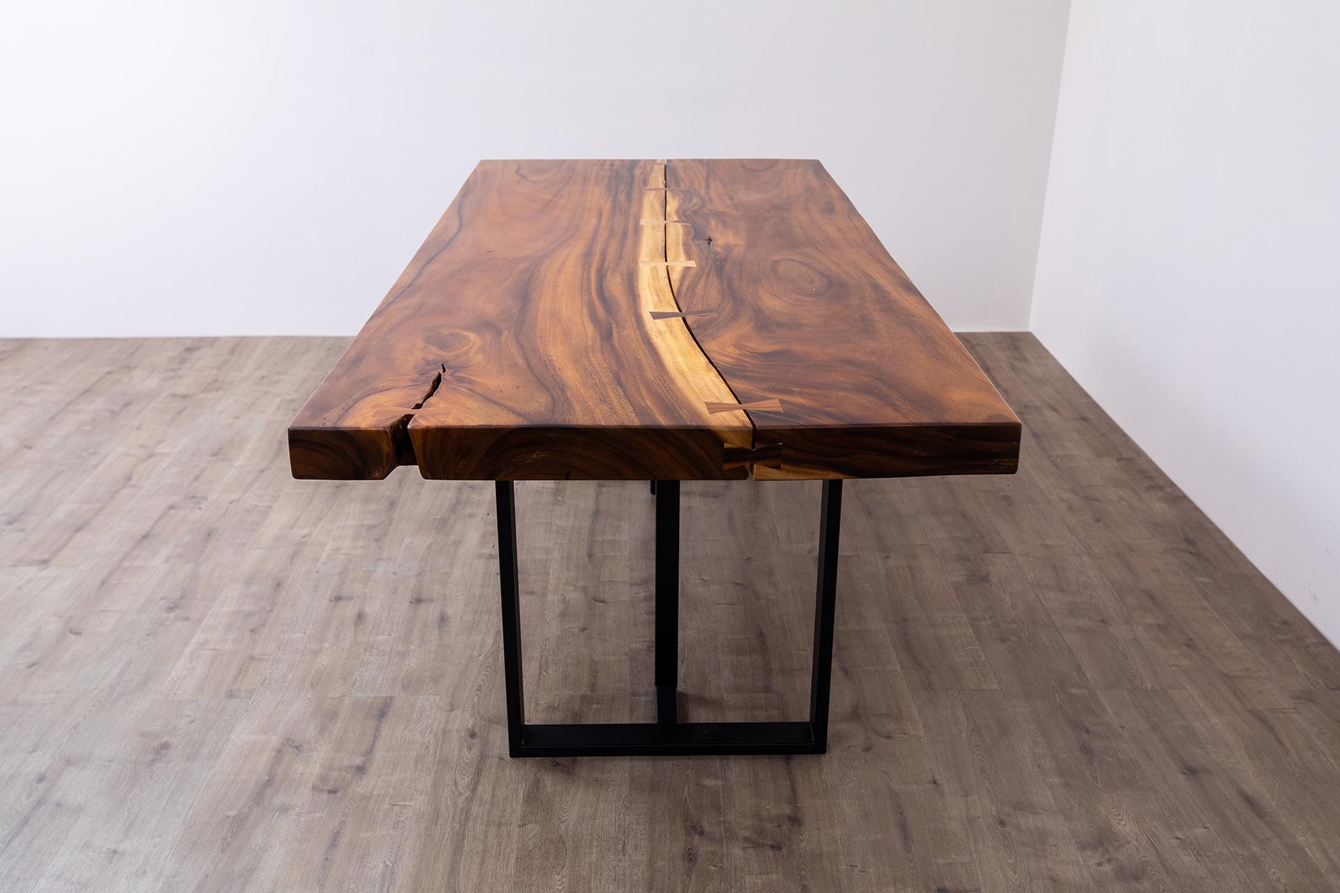 Discover the allure of our one-of-a-kind solid acacia dining/conference table, a true statement piece for your dining area. Handcrafted with care and attention to detail, this table showcases the natural beauty and uniqueness of solid acacia