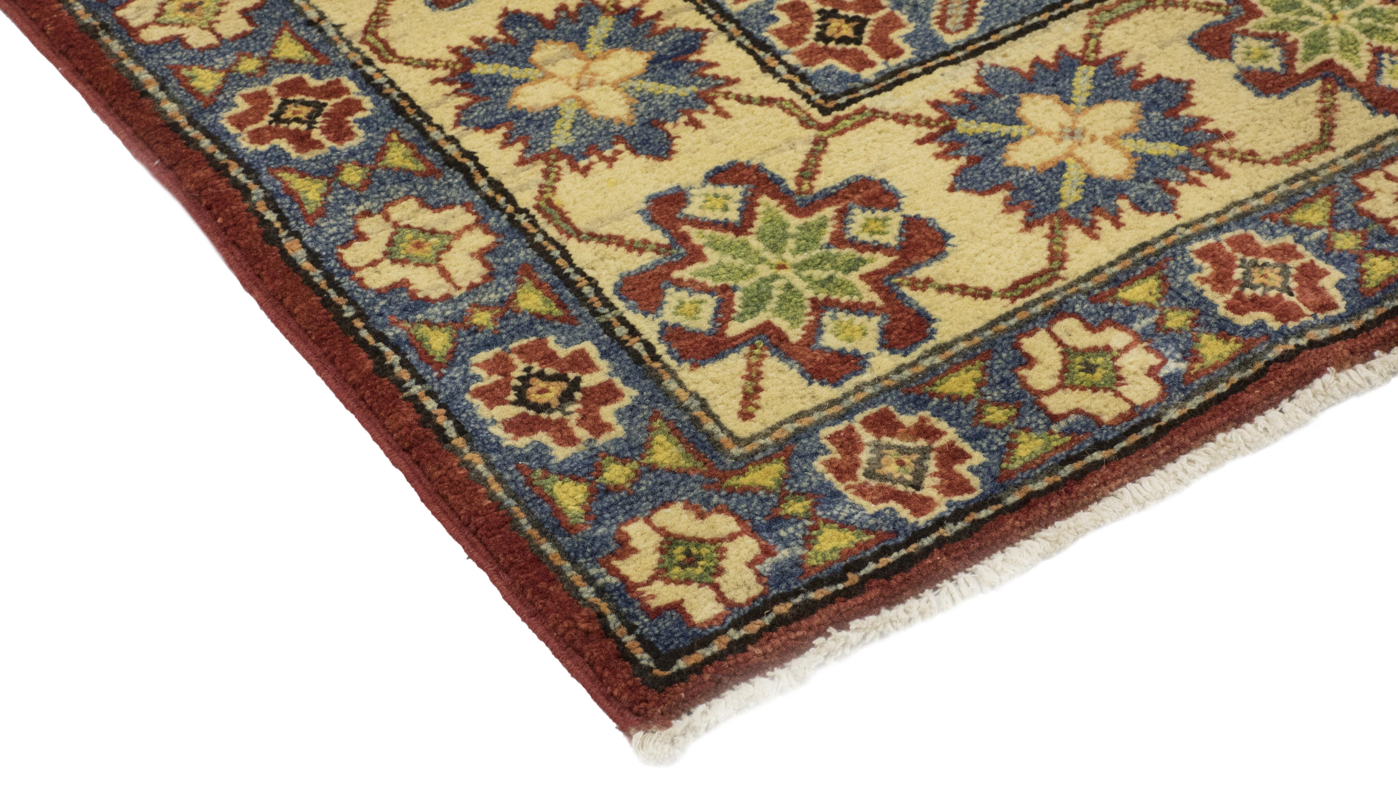 Color: Red, made in Pakistan. 100% wool. With their earthy palettes and geometric patterns, the hand knotted rugs of the Southwestern collection make beautiful additions to rustic and lodge-style rooms. At the same time, they contribute a sense of