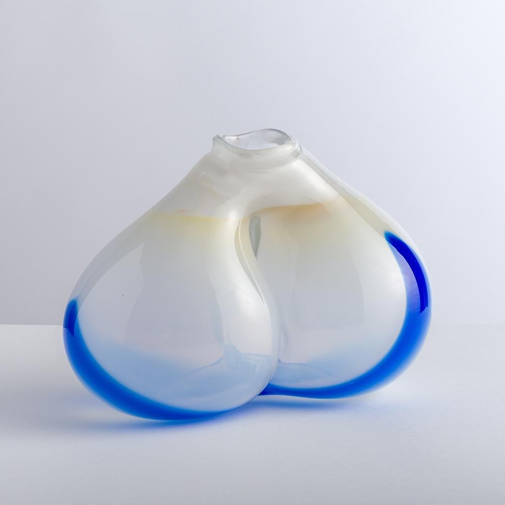 Hand blown vase / glass object by Uhinger glass artist Jörg F. Zimmermann.

This collectible and unique piece oscillates depending on the light and leaves a lot of room for interpretations and associations. You either love it or are disturbed by