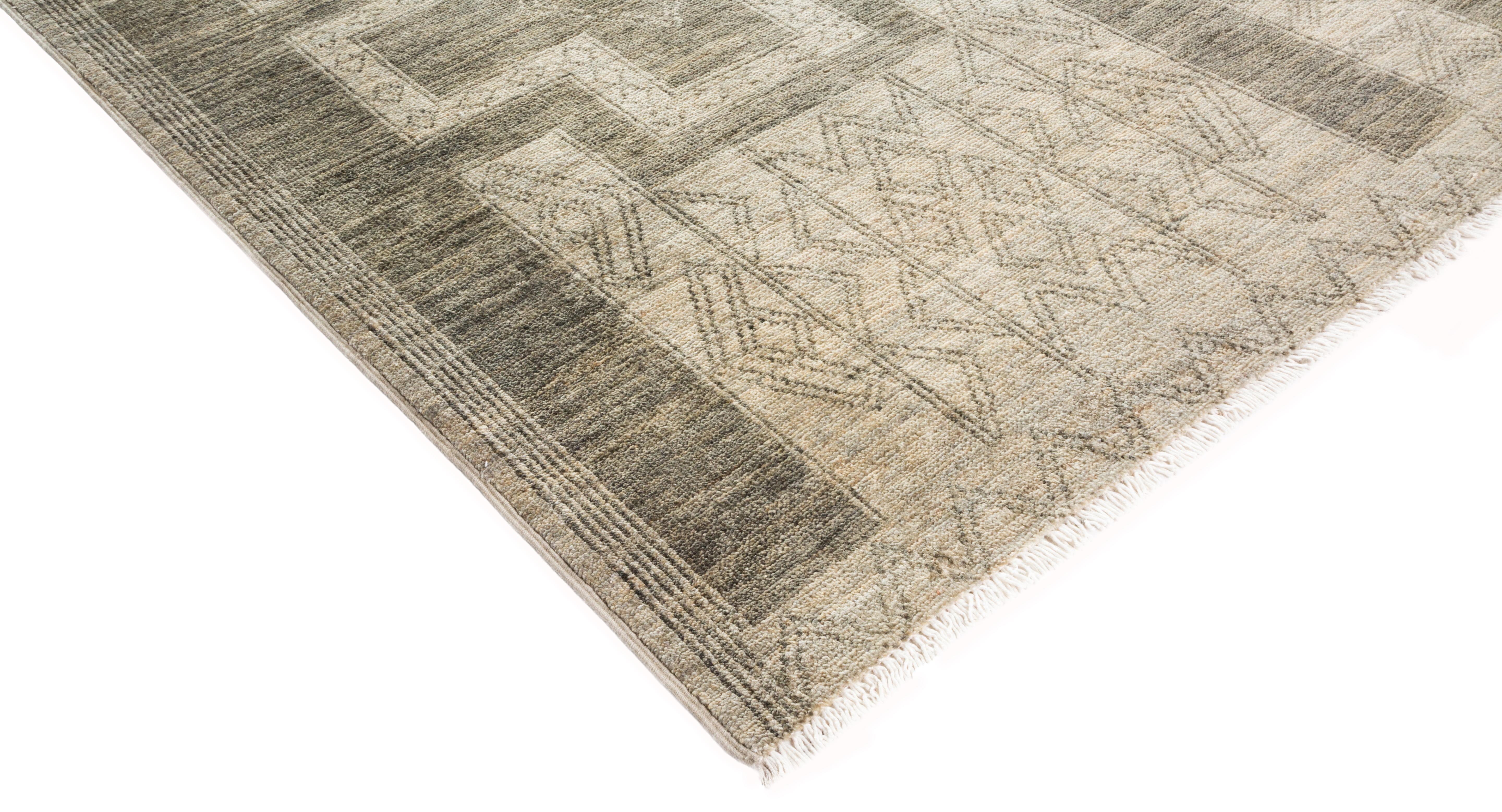Color: Beige - Made in: Pakistan. 100% wool. The rich textile tradition of western Africa inspired the Tribal collection of hand knotted rugs. Incorporating a medley of geometric motifs, in palettes ranging from earthy to vivacious, these rugs bring