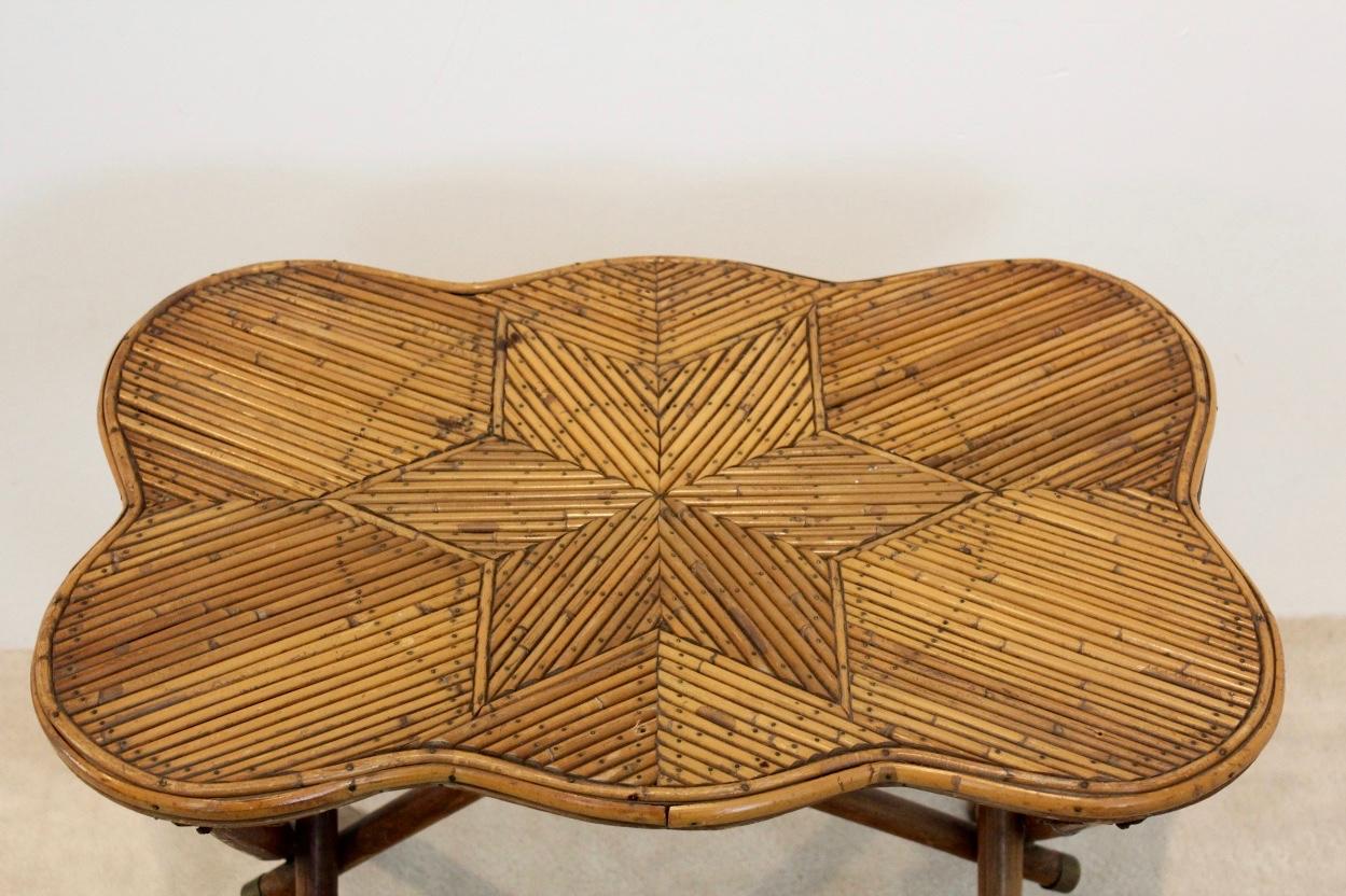 Gorgeous original colonial bamboo side table with star image inlay and a flower image made with nails. Unique and beautiful craftsmanship, one of a kind. Found in an old house in the Netherlands but probably originating from Indonesia. The table