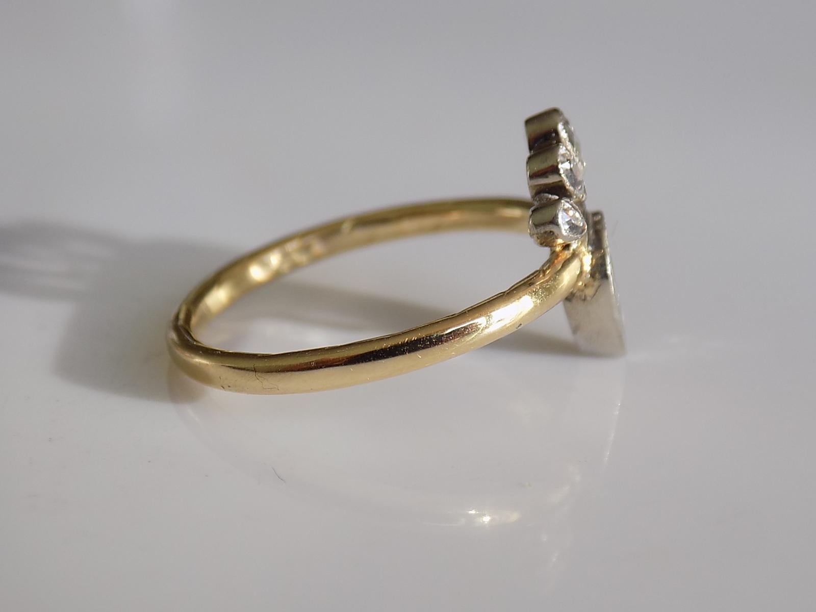 One of a kind Victorian c.1870 Old Cut Diamond Crowned Heart ring stick pin conversion. The diamonds in silver setting on later 18 Carat Gold shank (unmarked tested). Perfect as everyday ring. English origin. 
Crowned heart is symbol of Love
