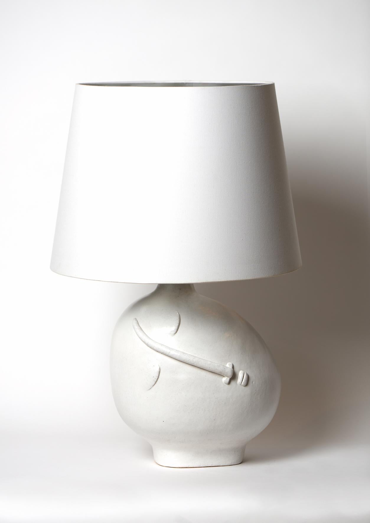 Hand-sculpted ceramic base lamp, stylized face 