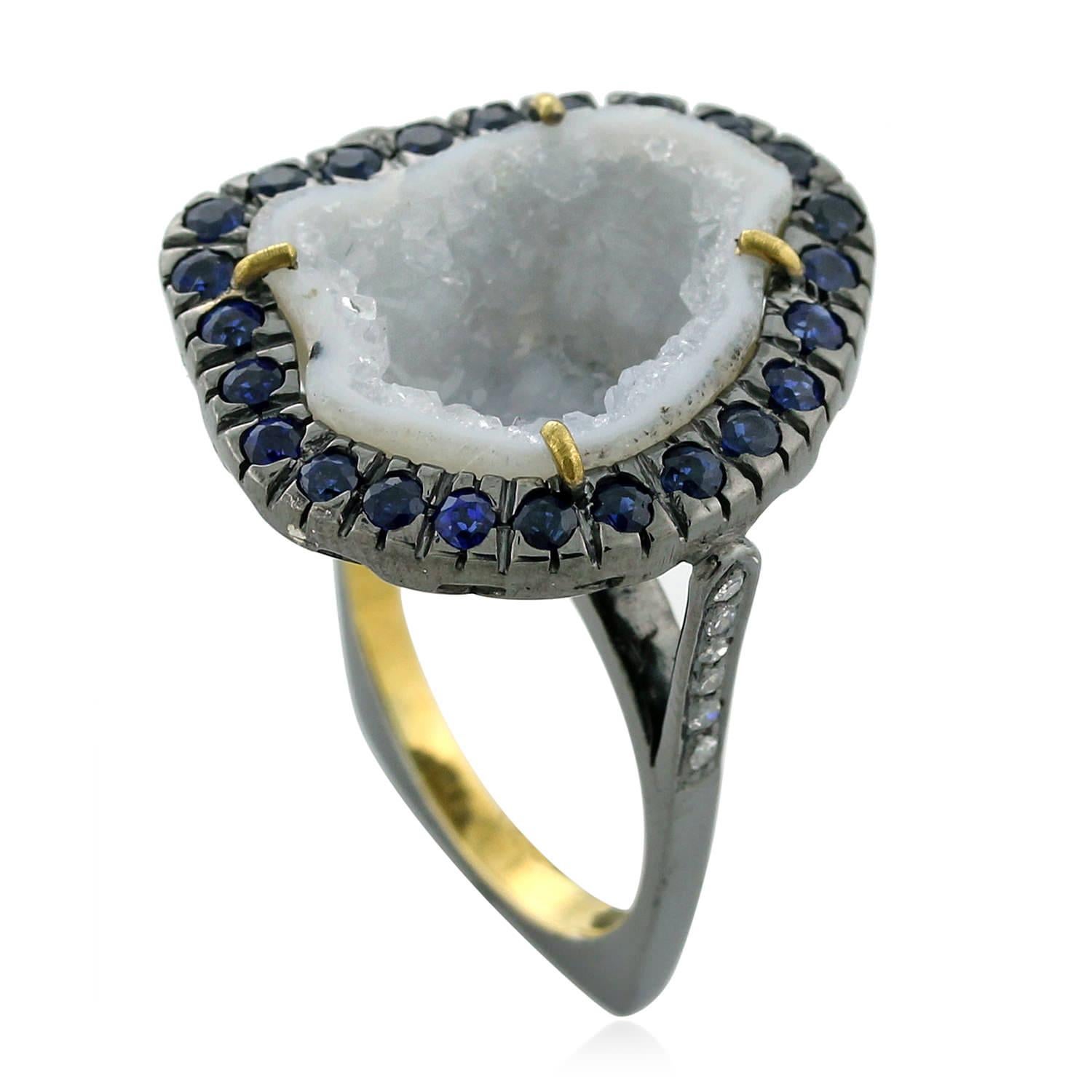 Designer One of a kind white geode with Diamonds and Sapphire set in Gold and Silver is perfect to accent with any of your denim outfits.

Ring Size: 7.25 ( Can be sized )

18kt