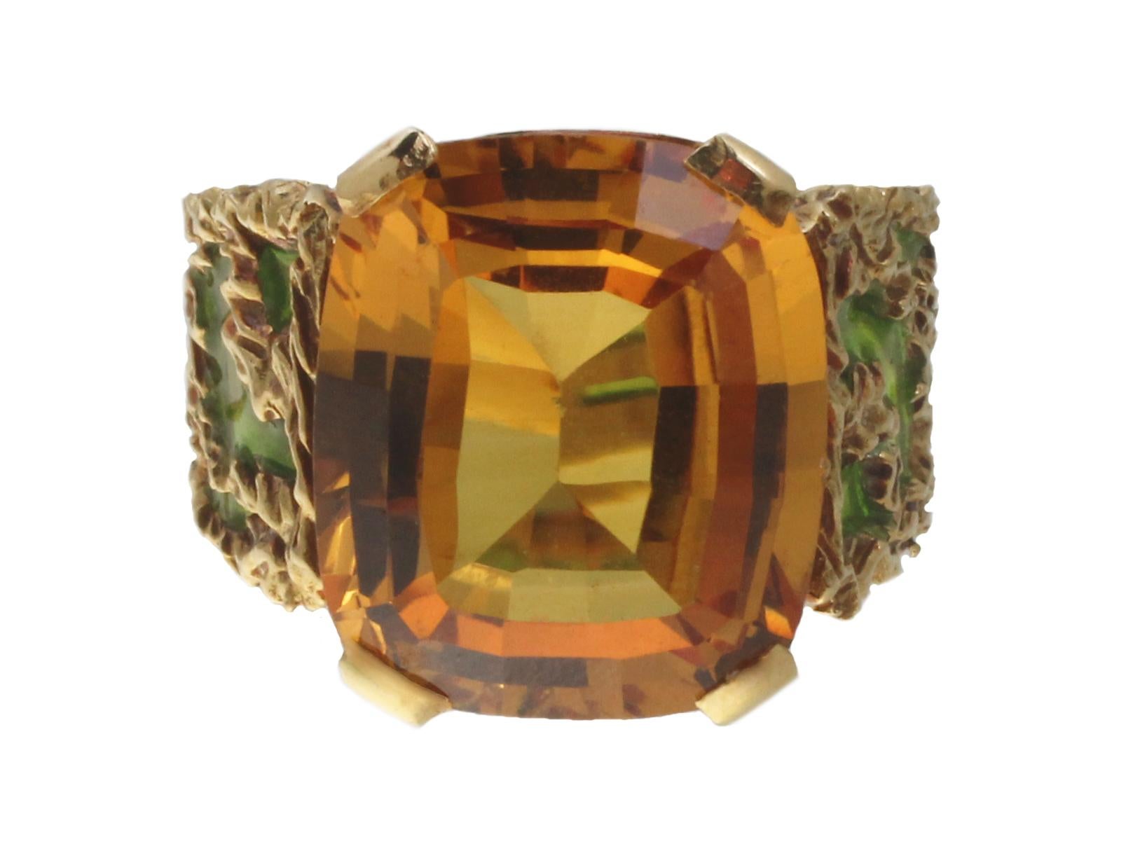 One of a kind green Plique-à-jour ring in 18 K yellow gold set with a yellow topaz as center stone. Handmade in Europe at the designer’s workshop. Inspired by the importance and richness of the Olive-tree in Mediterranean culture this ring depicts