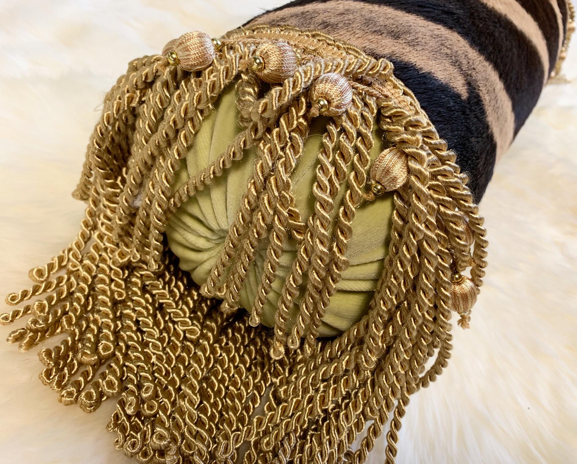 Forsyth zebra hide pillows are simply the best. The most beautiful hides are selected, hand cut, hand stitched, and hand stuffed with the finest goose down. Each step is meticulously curated by Saint Louis based Forsyth artisans. This fringe and