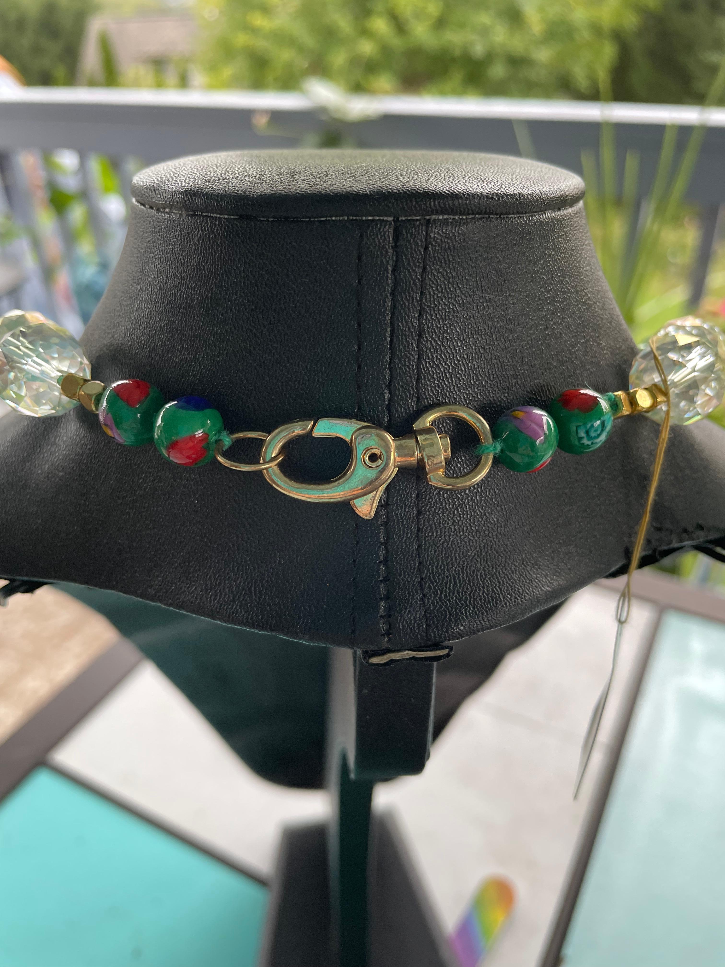 One of a kind,handmade,statement necklace with 50’s crystal brooch on a string of vintage Czech glass beads. Venetian glass beads and a goldtone clasp complete this piece.