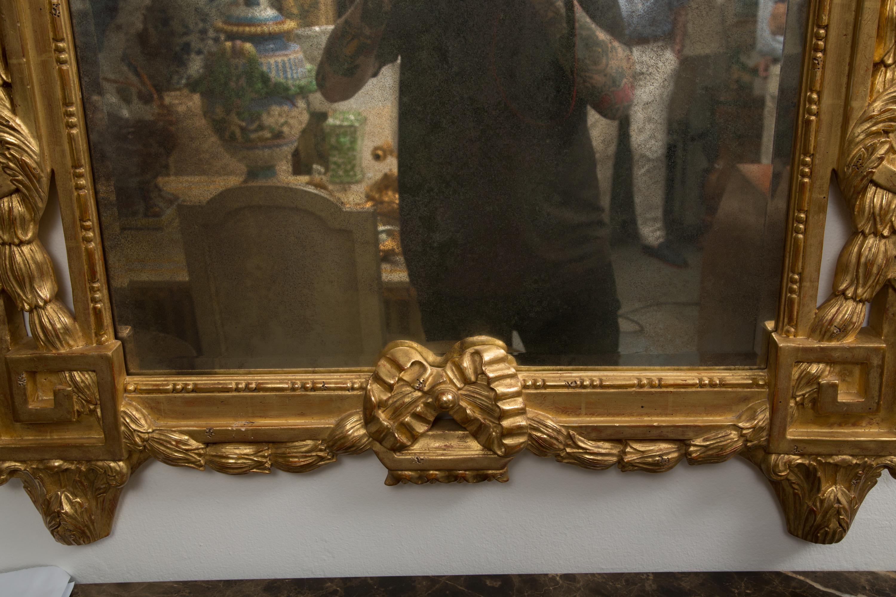 Other One of a Pair of Carved Giltwood Italian Wall Mirrors