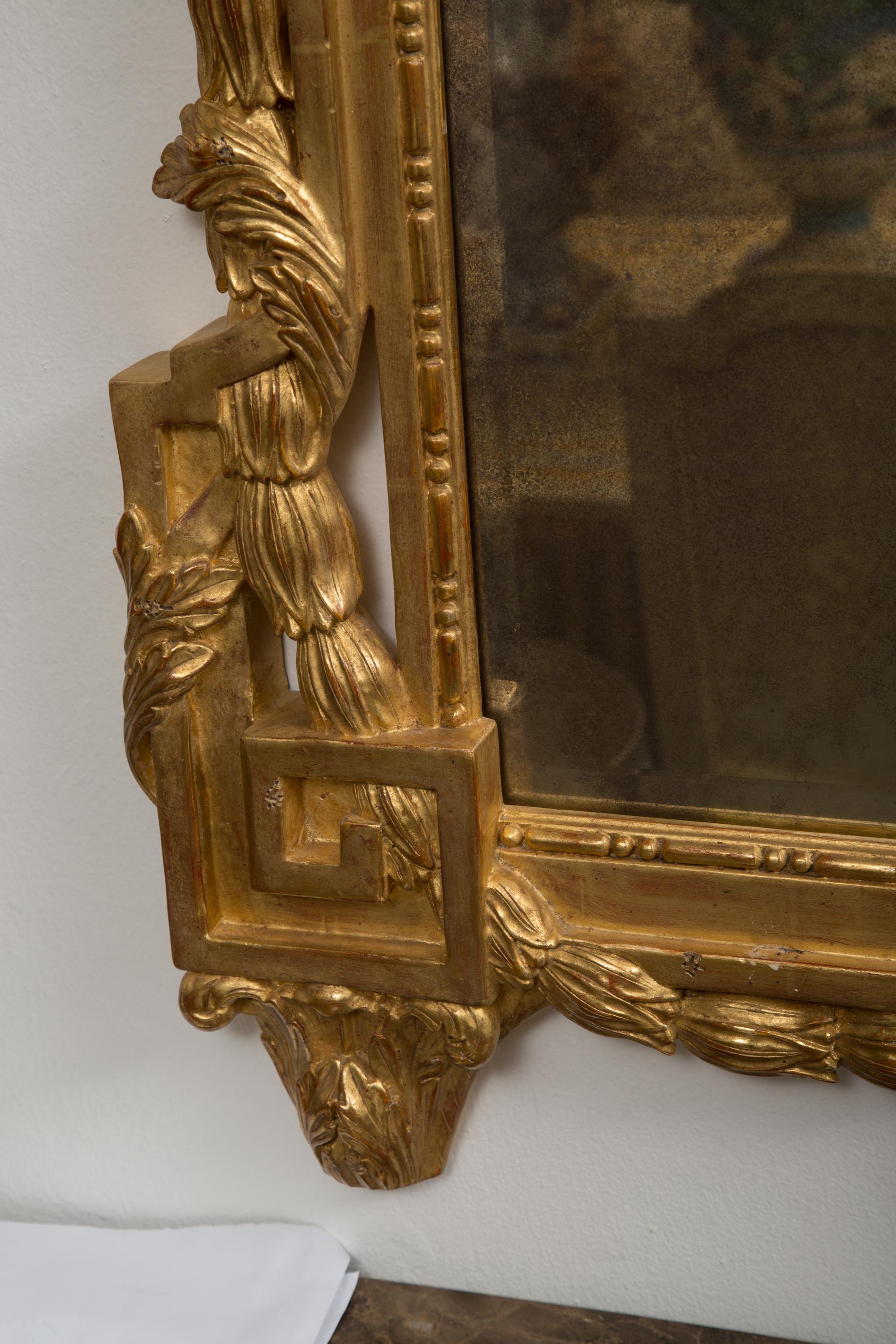 French One of a Pair of Carved Giltwood Italian Wall Mirrors