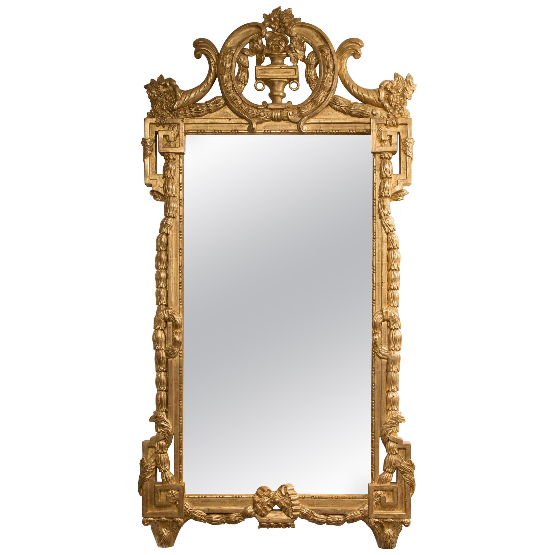 One of a Pair of Carved Giltwood Italian Wall Mirrors