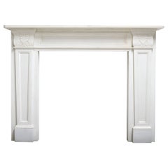 One of a Pair Regency Style Statuary Marble Surround with Acanthus