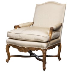 One of an Identical Pair of French Louis XV Style Walnut Armchairs