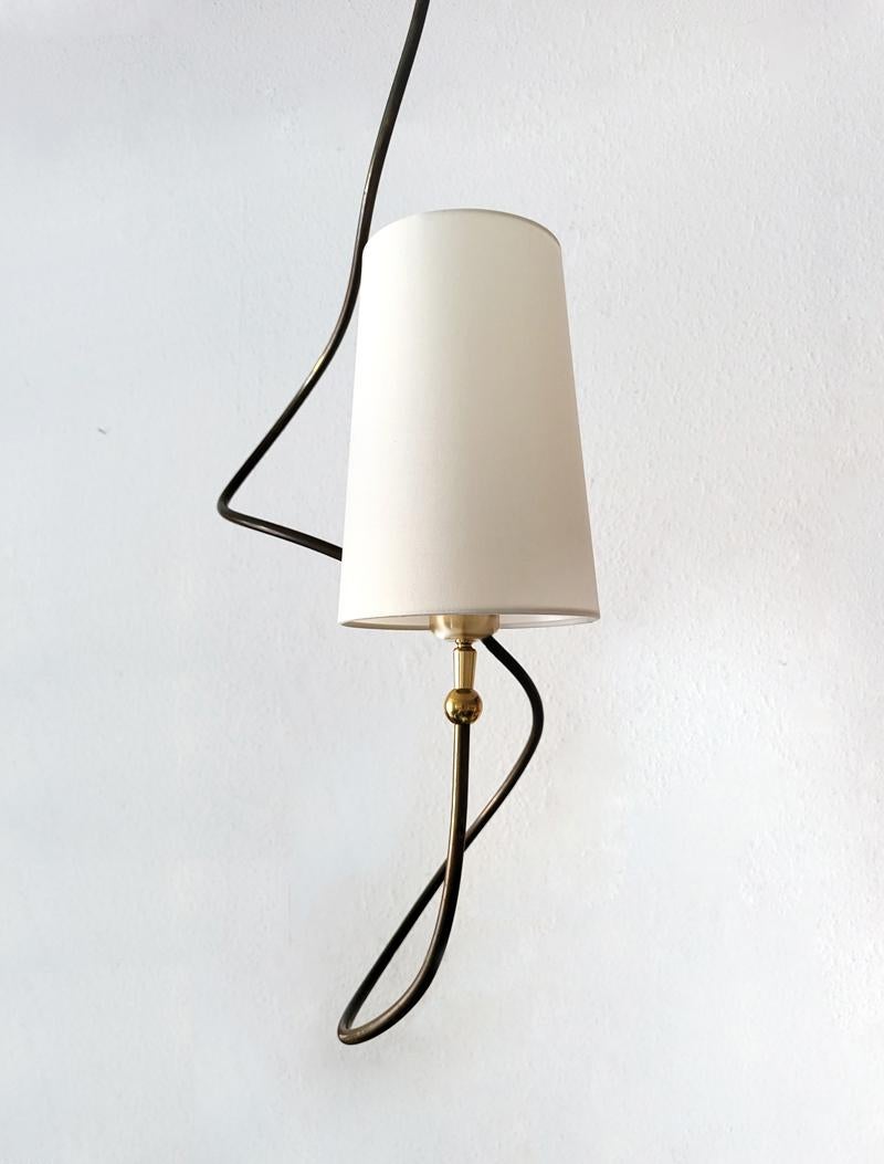 One of ... beautiful organic solid brass frame and textil lampshade pendant light by miiss Studio,
Germany
