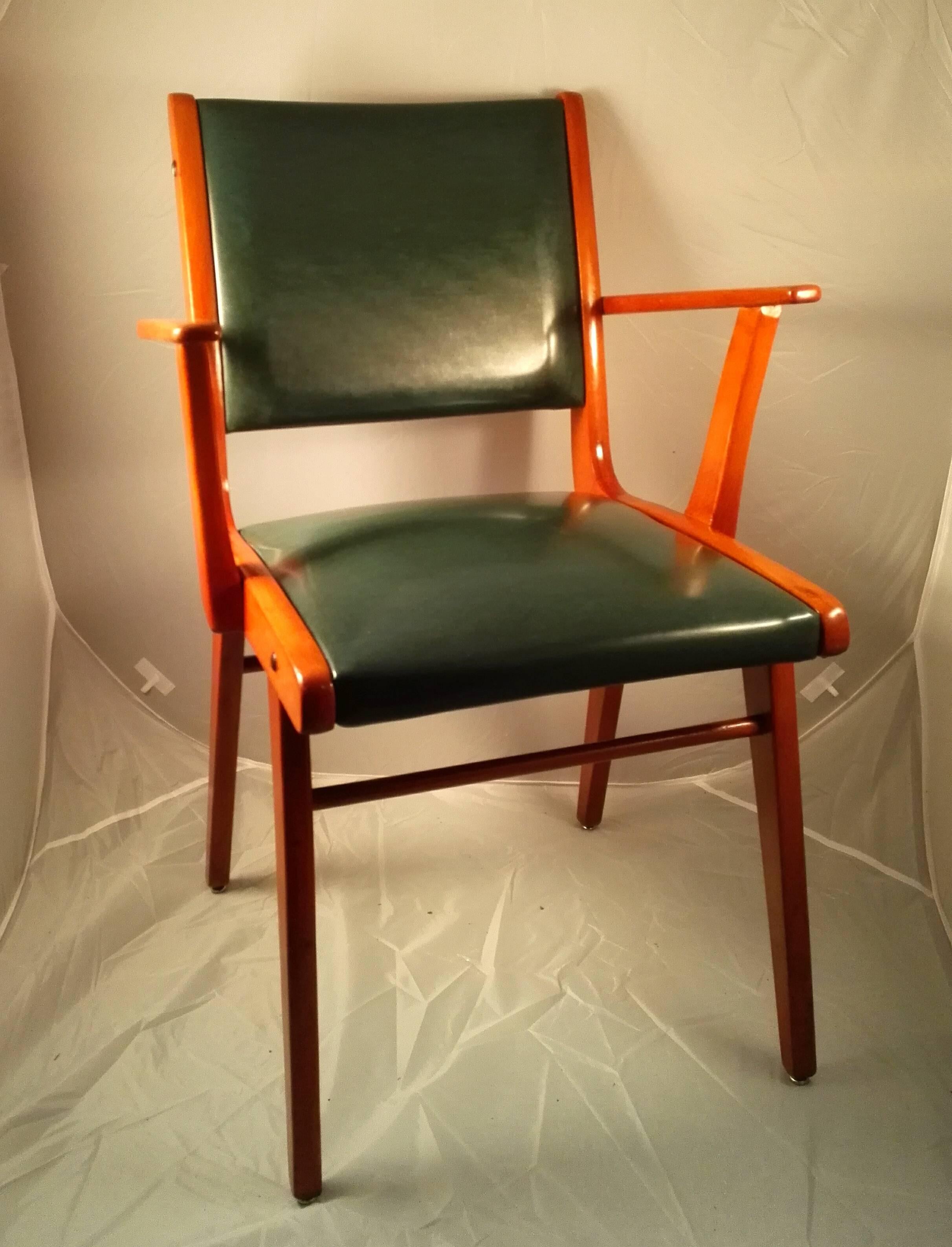 One of eight strong and in wonderful colored beechwood, hand polished Armchairs from circa 1940! With green (British racing green), upholstery!