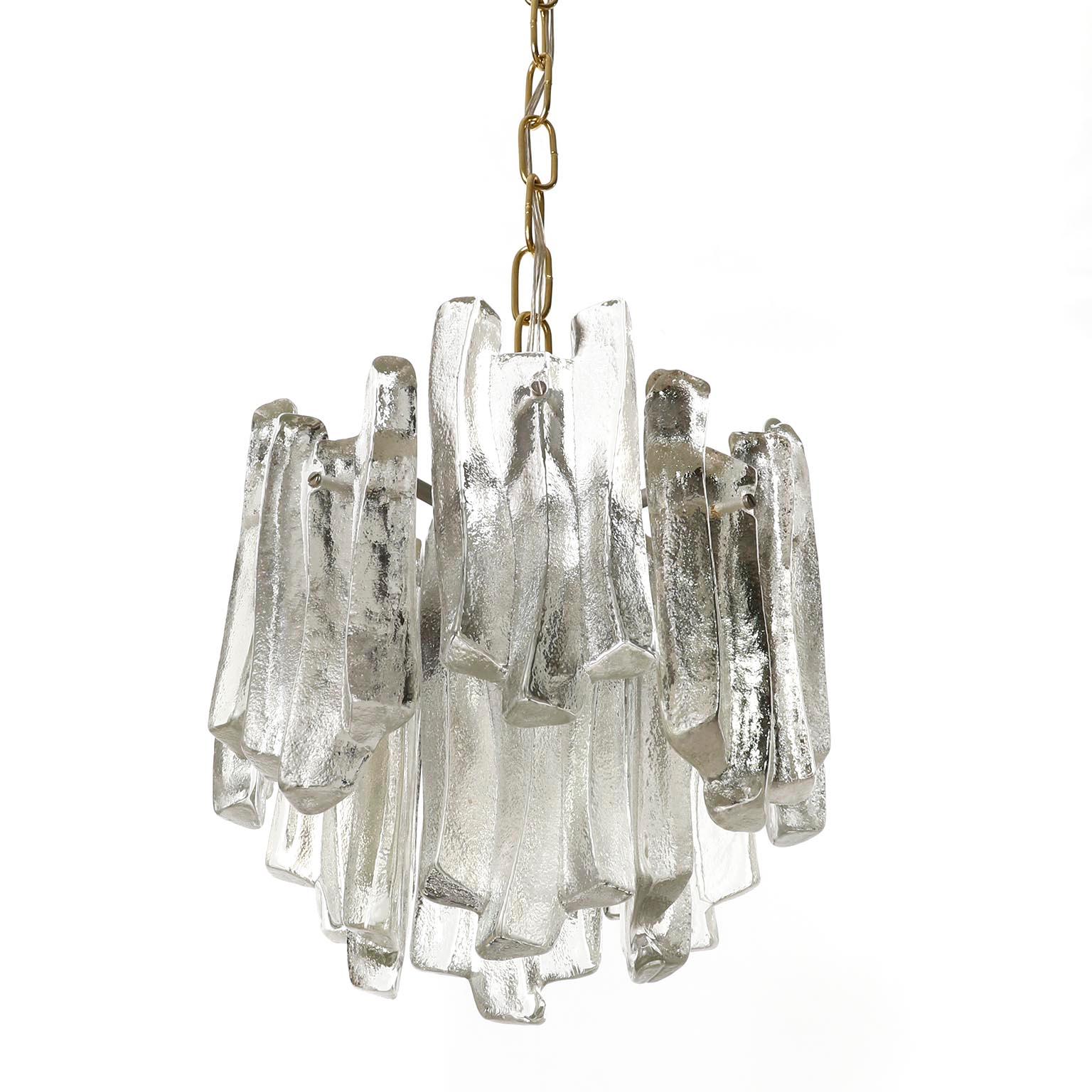 Late 20th Century One of Five Kalmar Ice Glass Chandeliers Pendant Lights, Cast Glass Brass, 1970s For Sale