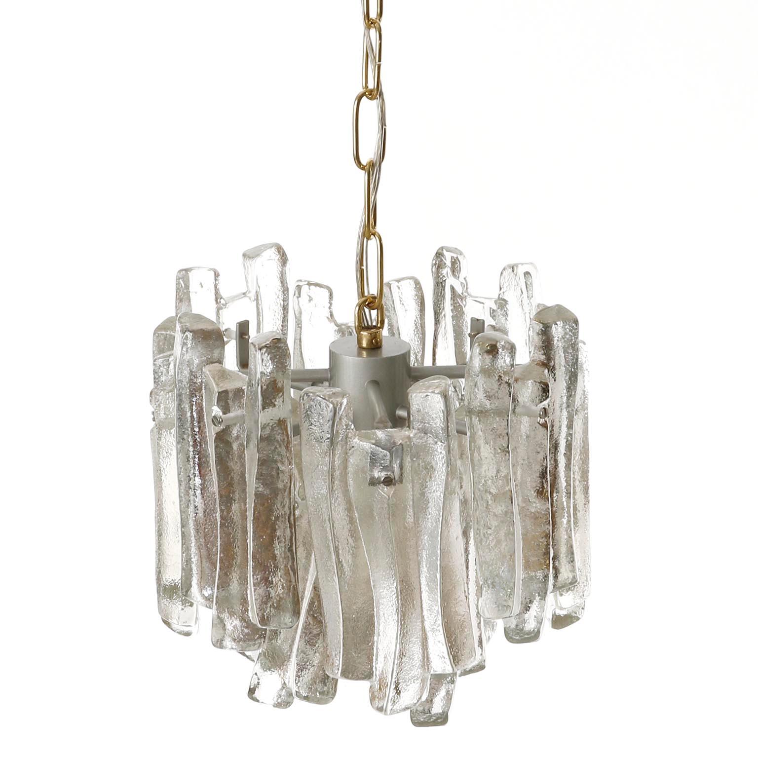 Metal One of Five Kalmar Ice Glass Chandeliers Pendant Lights, Cast Glass Brass, 1970s For Sale