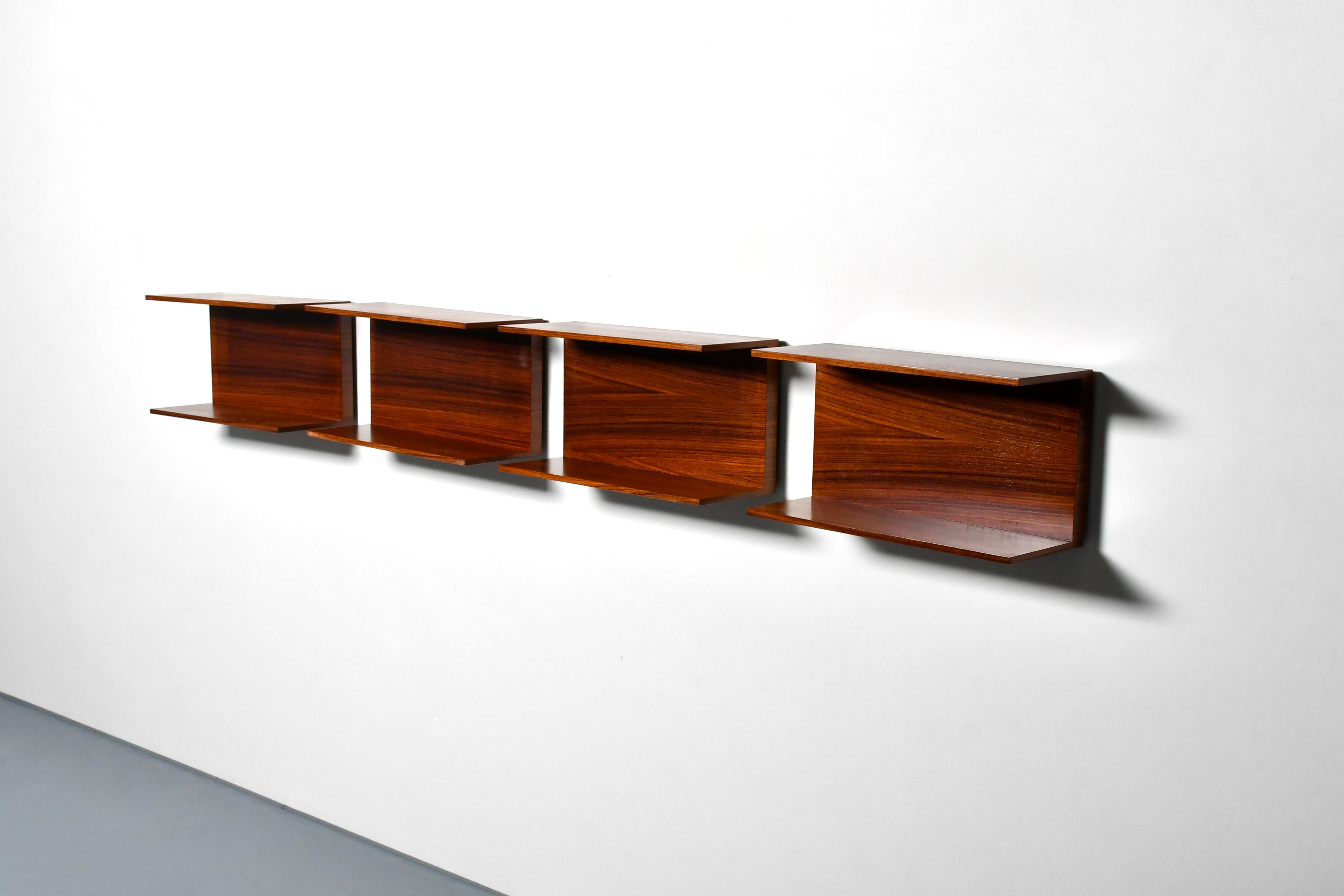 Wall shelves designed by Walter Wirz in very good condition.

Manufactured by Wilhelm Renz in the 1960s.

The shelves are made of a beautiful rosewood and have a gorgeous grain and color. 

The shelves can be combined in many different ways, this