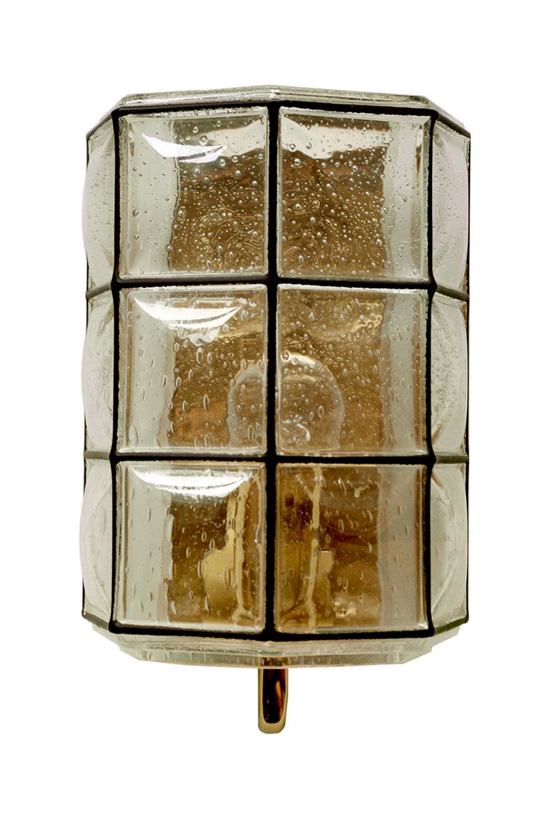 One of ... blown bubble glass and brass sconce. 
Germany, 1960s.
  