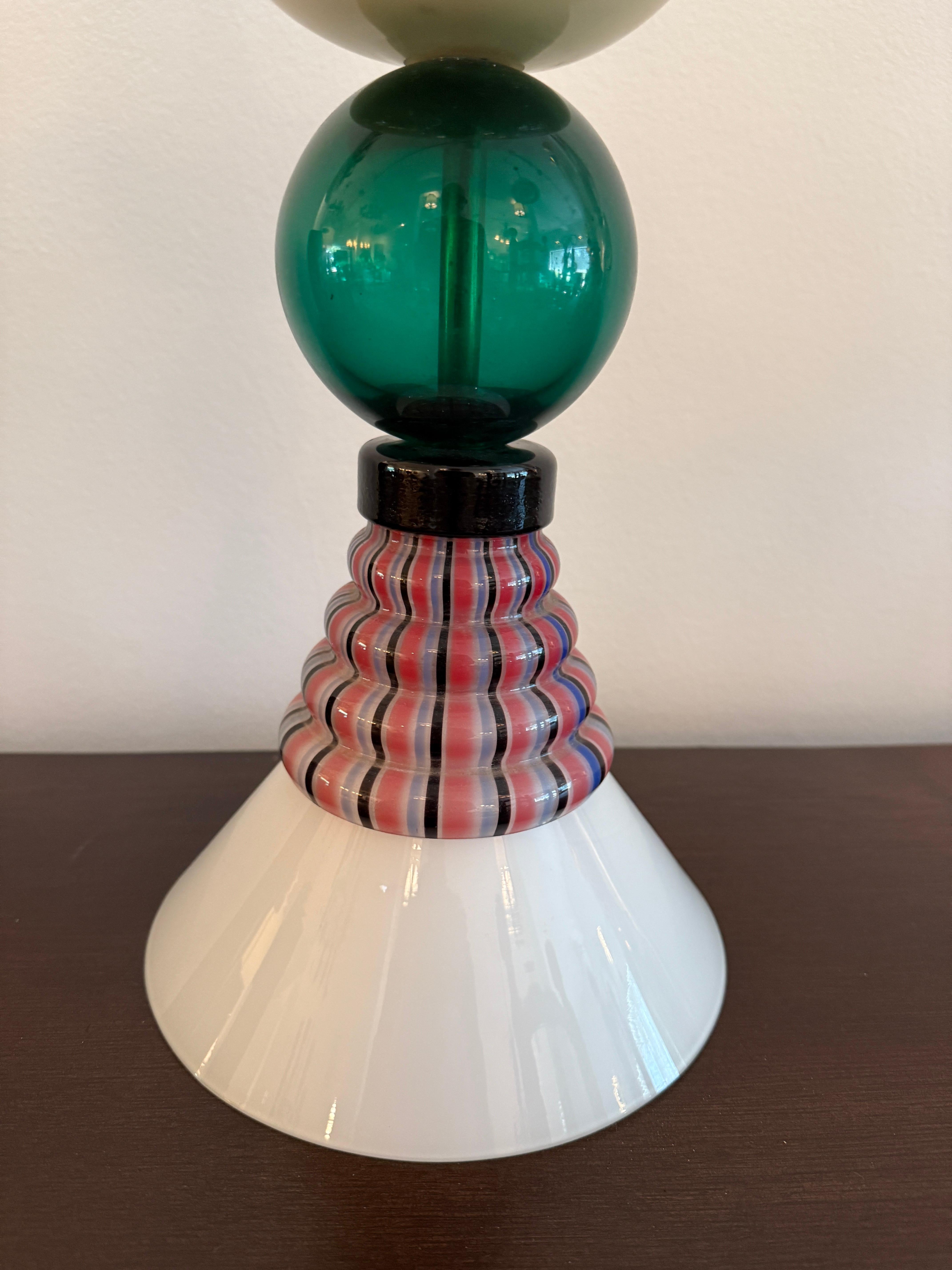 This is a RARE creation made by artisans in Murano, Italy comprising of pieces from vintage chandeliers that have lost pieces and made up a NEW and unique pendant light with a brass rod and canopy. Rewired and ready to hang! We have several other