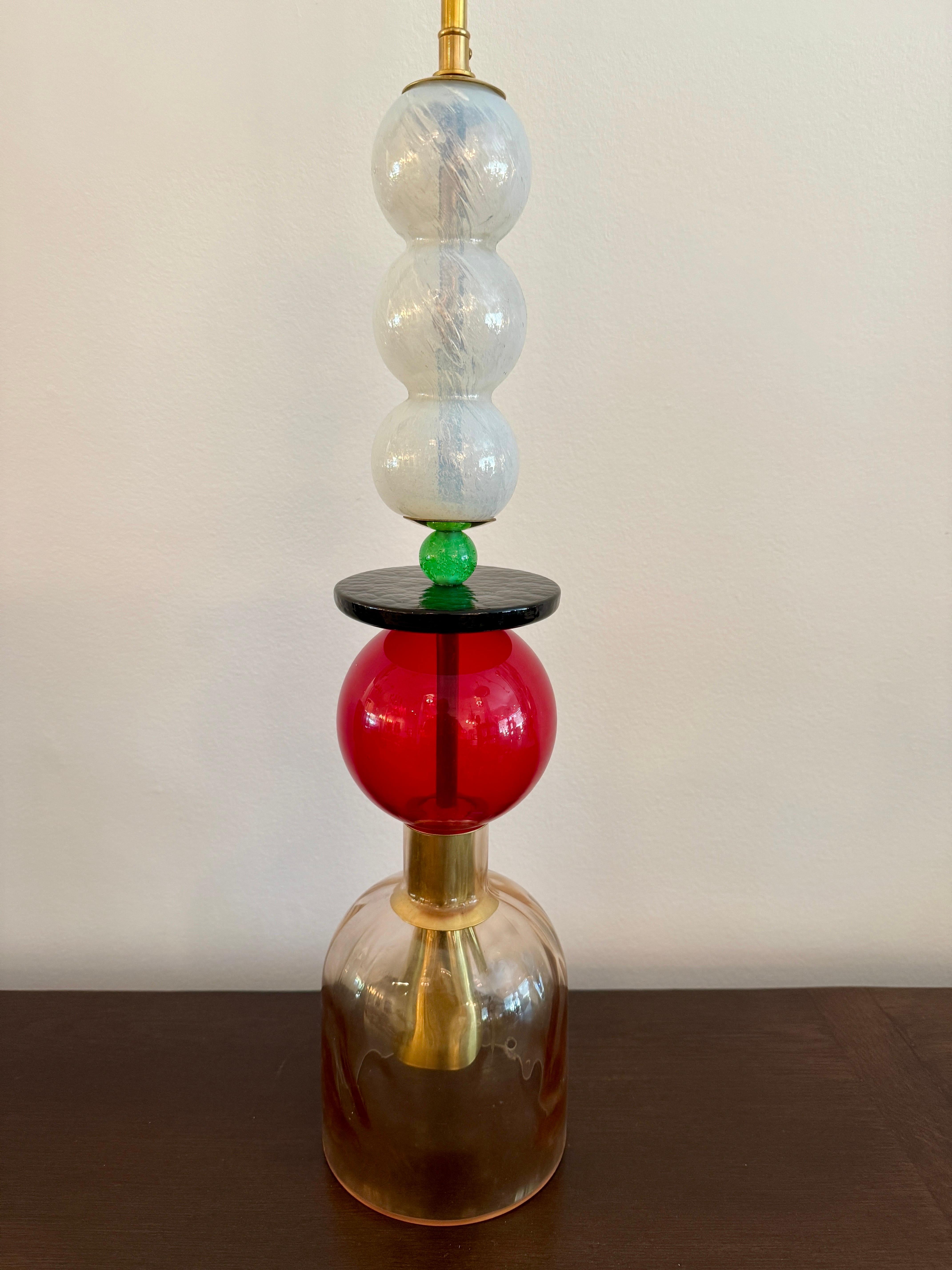 This is a RARE creation made by artisans in Murano, Italy comprising of pieces from vintage chandeliers that have lost pieces and made up a NEW and unique pendant light with a brass rod and canopy. Rewired and ready to hang! We have several other