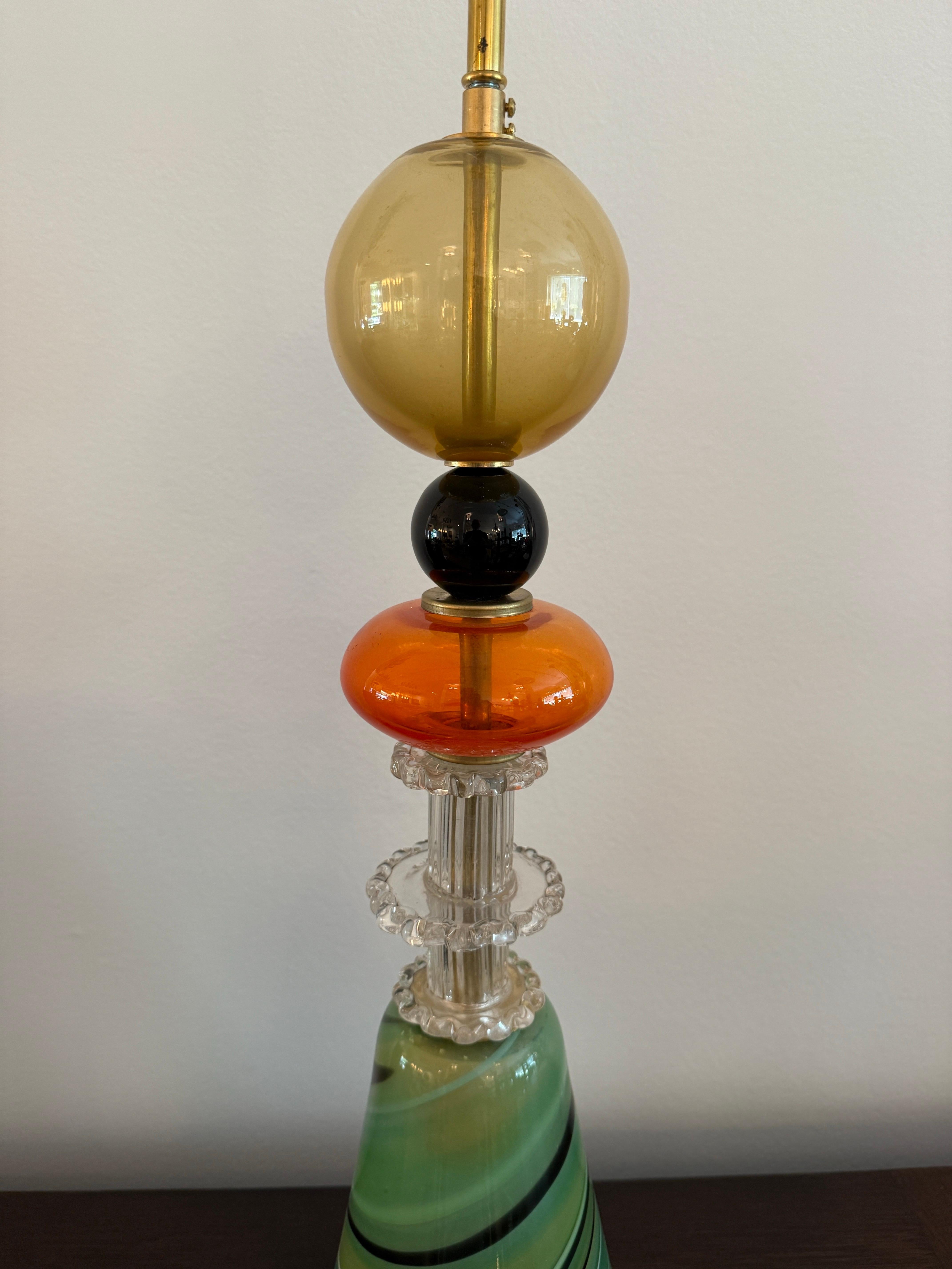 This is a RARE creation made by artisans in Murano, Italy comprising of pieces from vintage chandeliers that have lost pieces and made up a NEW and unique pendant light with a brass rod and canopy. Rewired and ready to hang! We have several other