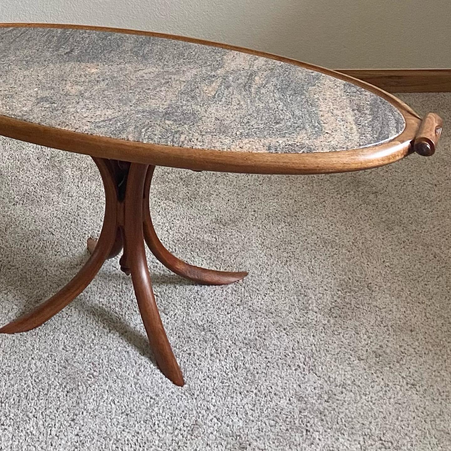 One-of-a-kind + studio-made in walnut and detailed in cherry and wenge per the artist, Scott Parsons, from whom this was acquired. The manner in which the splayed base references the curvature of the oval top feels surprisingly harmonious, yet the