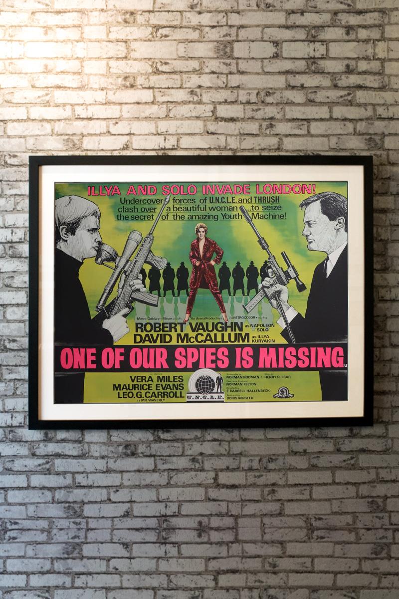 Agents Napoleon Solo (Robert Vaughn) and Illya Kuryakin (David McCallum) race THRUSH, a diabolical organization, to a youth serum.

Linen-backing:
£150

Framing options:
Glass and single mount £250
Glass and double mount £275
Anti UV glass