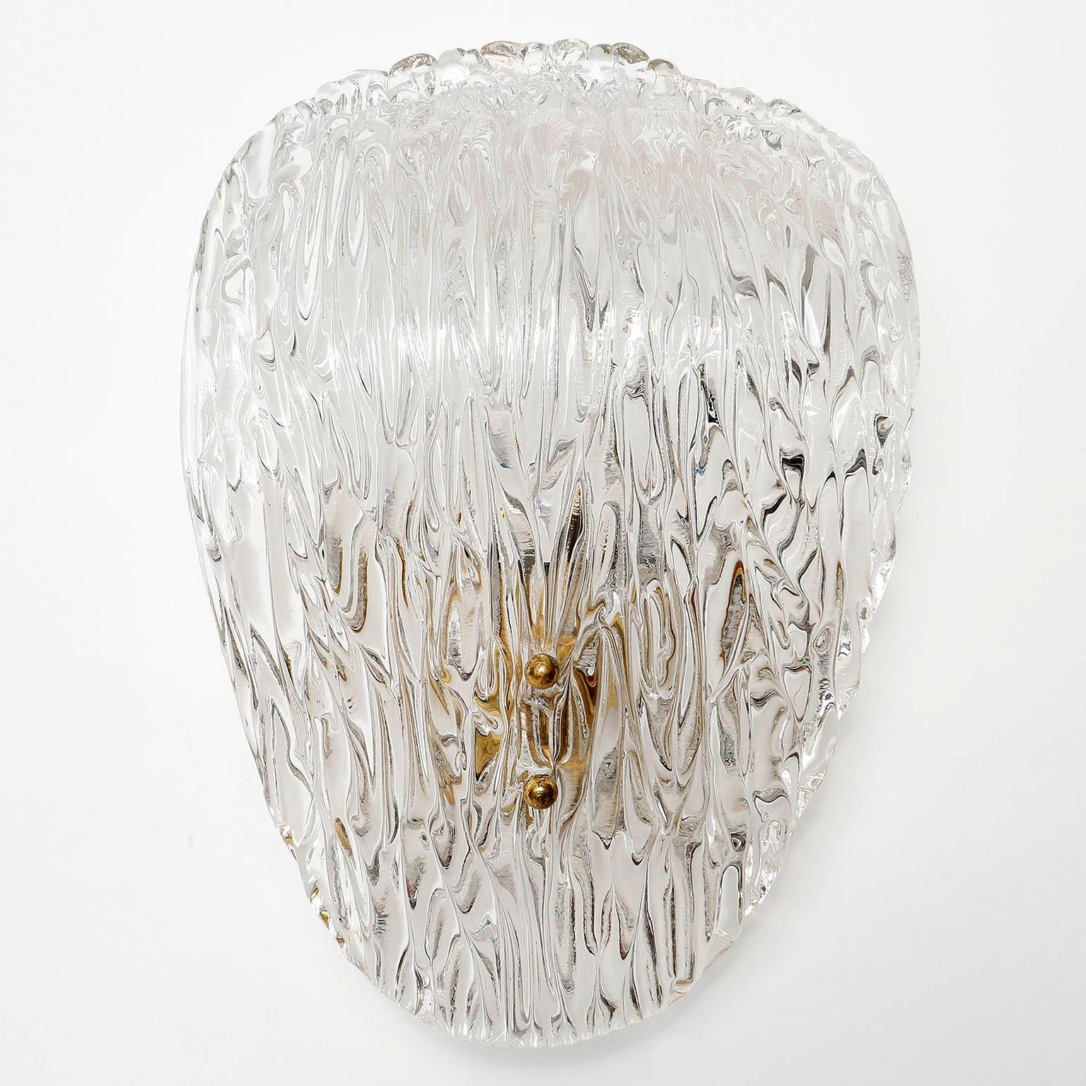 One of six beautiful wall lights model 'Vongola' no. 4377, by J.T. Kalmar, Austria, manufactured in midcentury, circa 1960 (late 1950s or early 1960s).
The price is per light. They are sold individually, as pair or as set of three, four, five or six