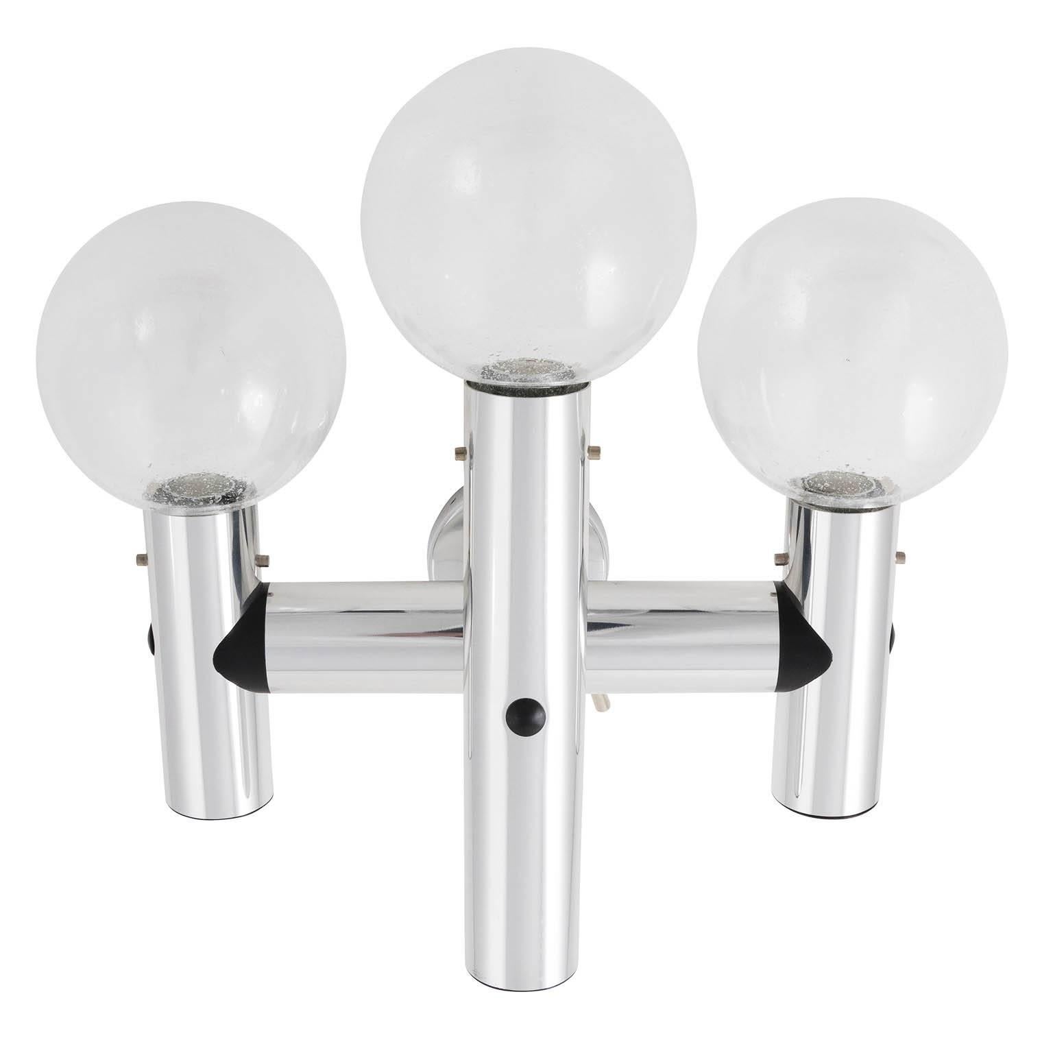 Ten (five pairs of) large J.T. Kalmar wall lights manufactured in Austria in Mid-Century, circa 1970 (late 1960s or early 1970s).
They are made of polished aluminum and handblown bubble glass lampshades. Each sconce takes three small screw base