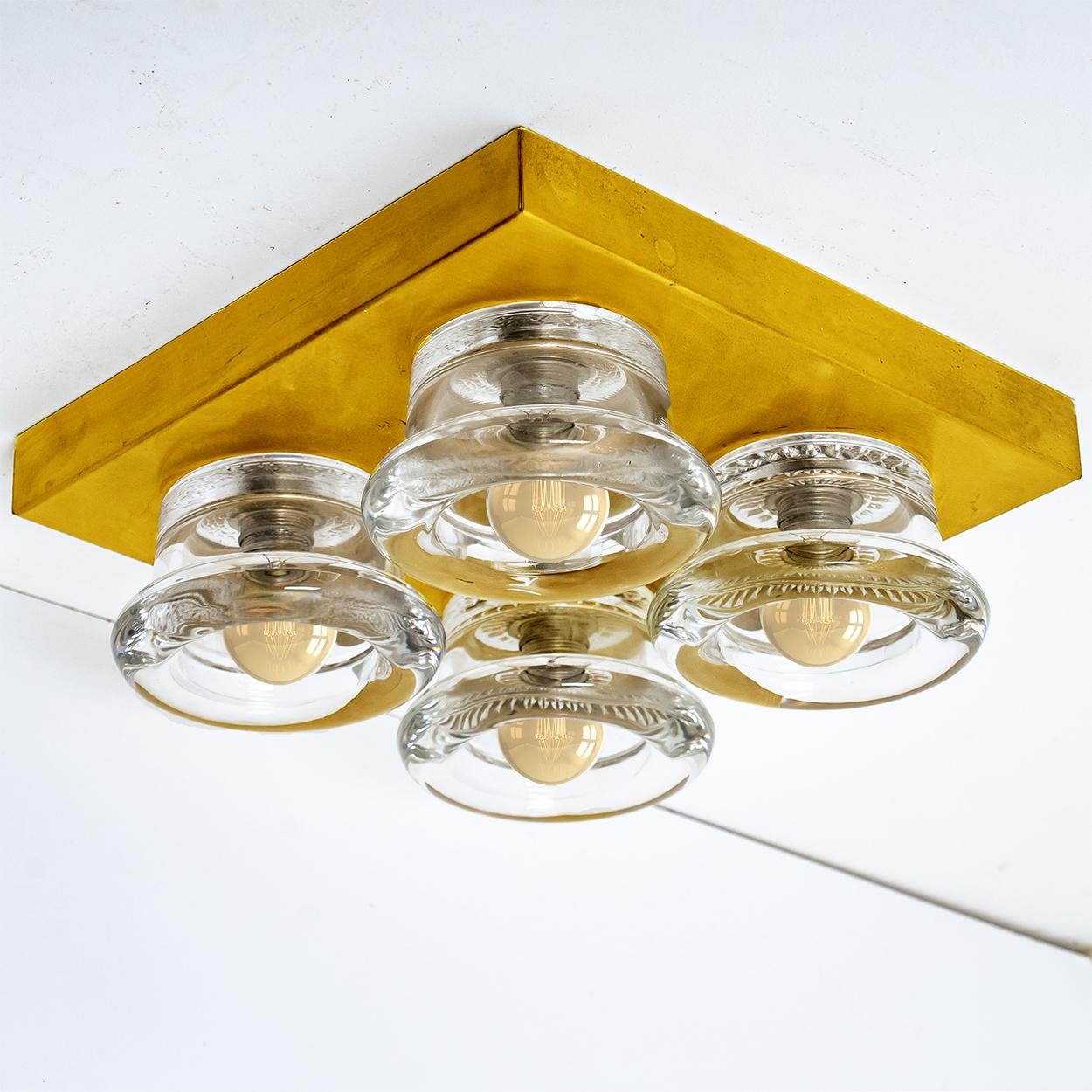 One of the six original glass wall sconces flush mounts Cosack Lights, Germany, 1970s

Original 1970s modernist wall light with four glass lighting elements. This light was designed and produced by Cosack Lights, one of the premium light producer is