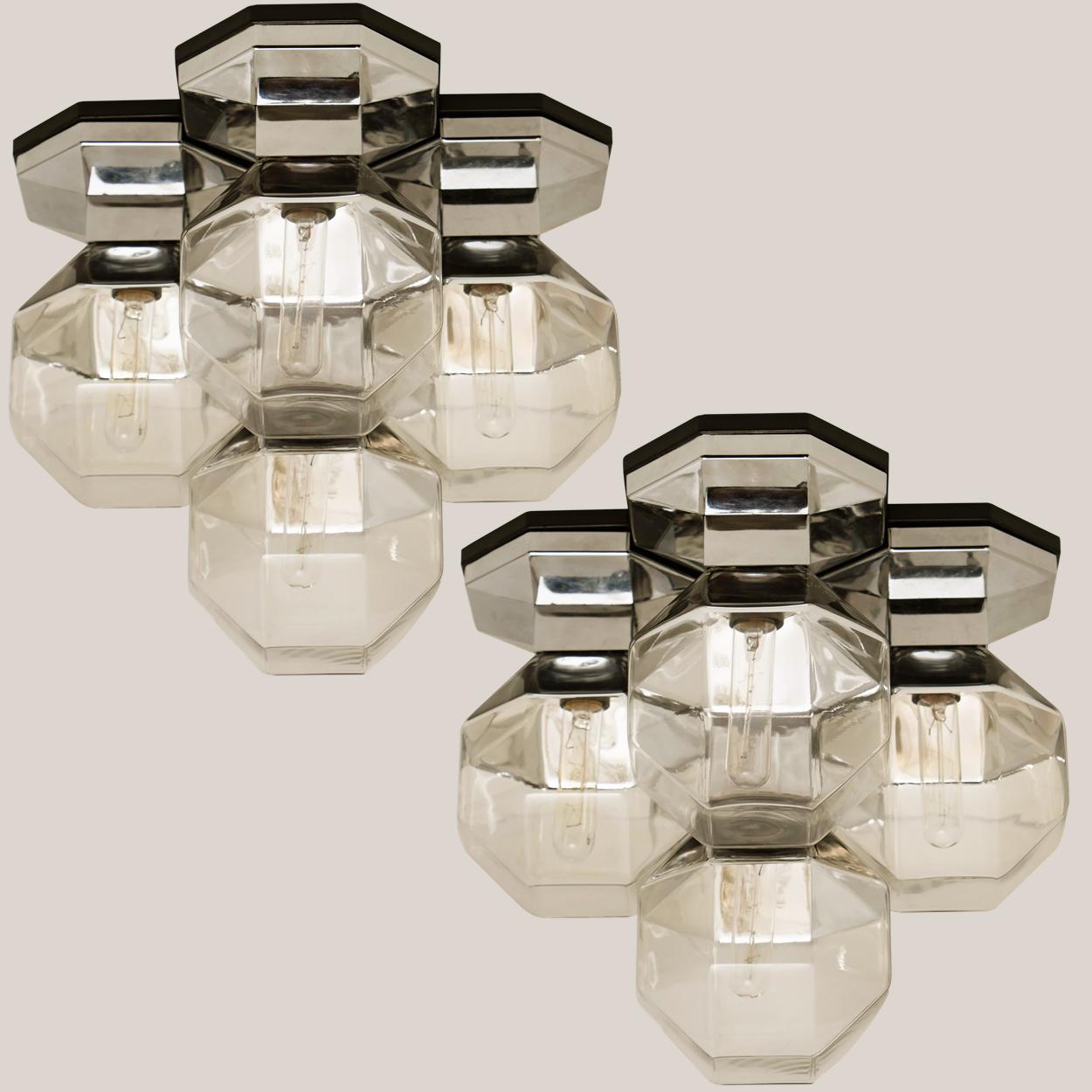 One of the four rare wall or flushmount ceiling lamps by Motoko Ishii for Staff Lighting Company, Germany. Heat-resistant resin, metalized base and 4 clear glass shades. Beautiful design, reflective lamps in all directions. Typical design from the
