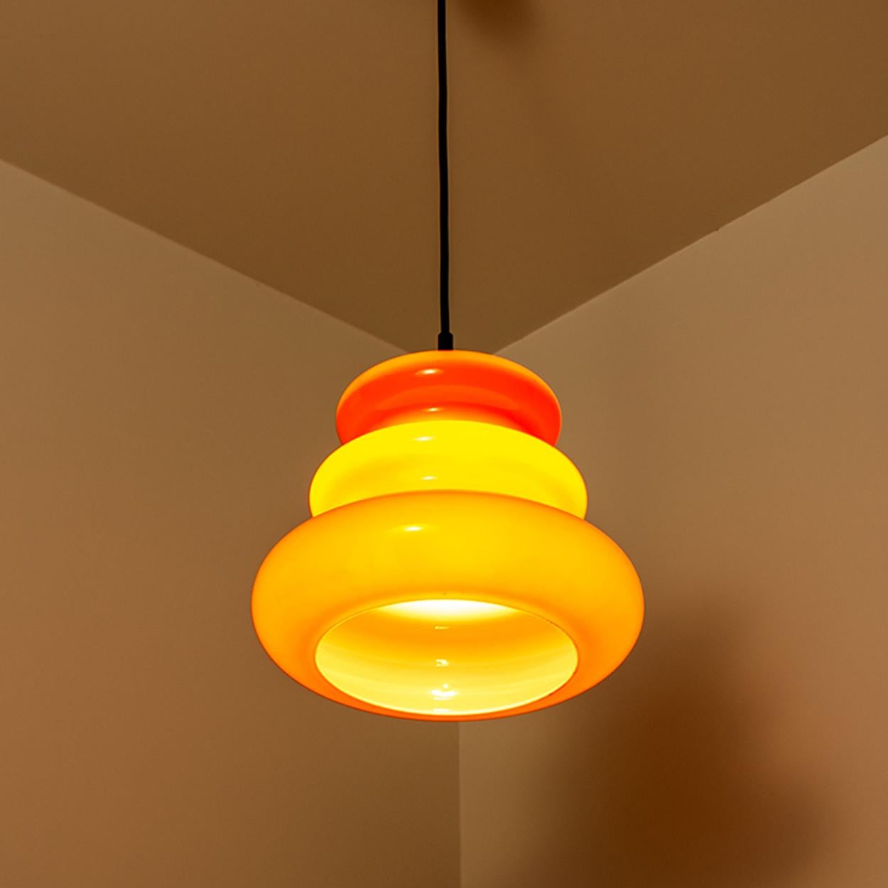 One of the Six Orange Peill & Putzler Pendant Lights, 1970s 6