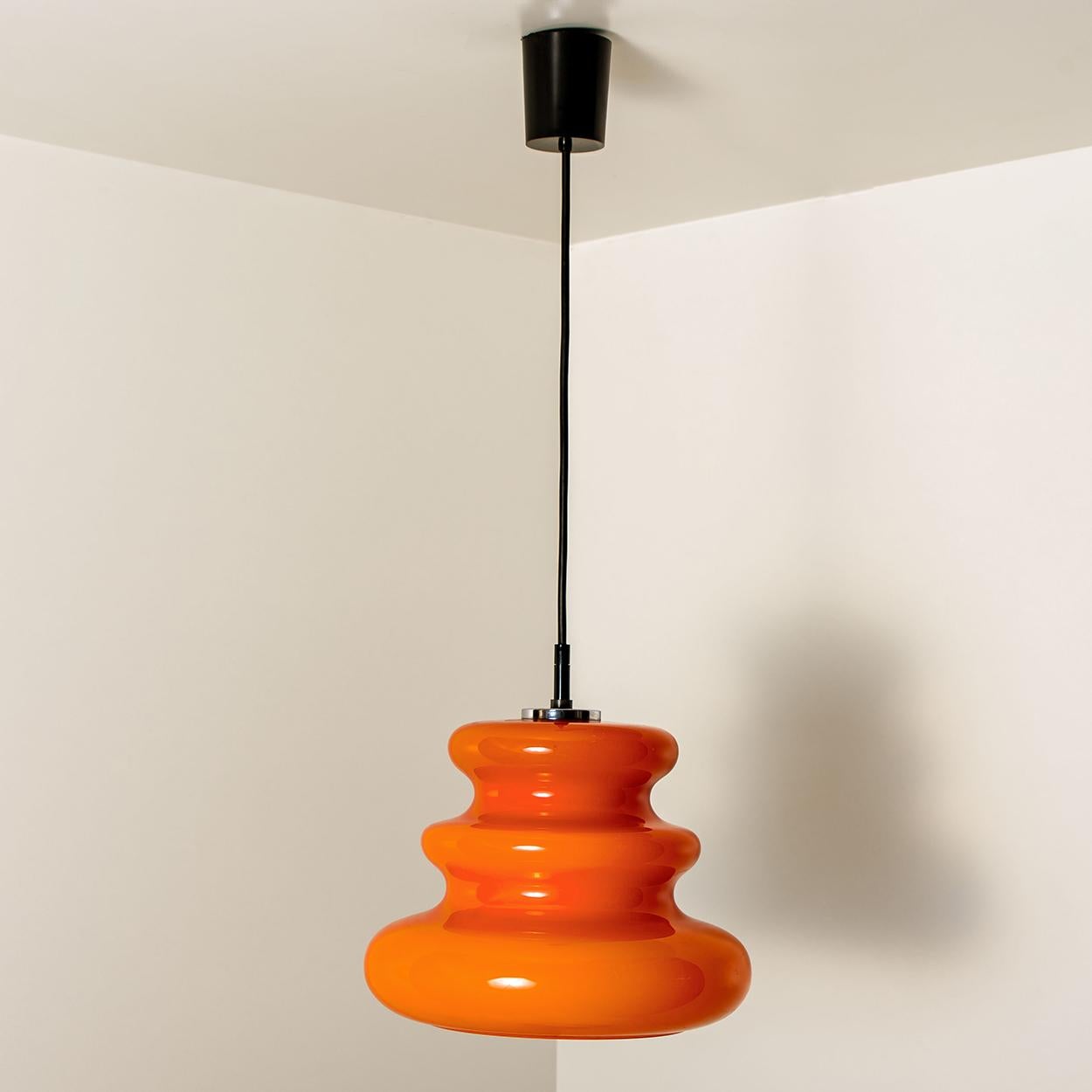 Blown Glass One of the Six Orange Peill & Putzler Pendant Lights, 1970s