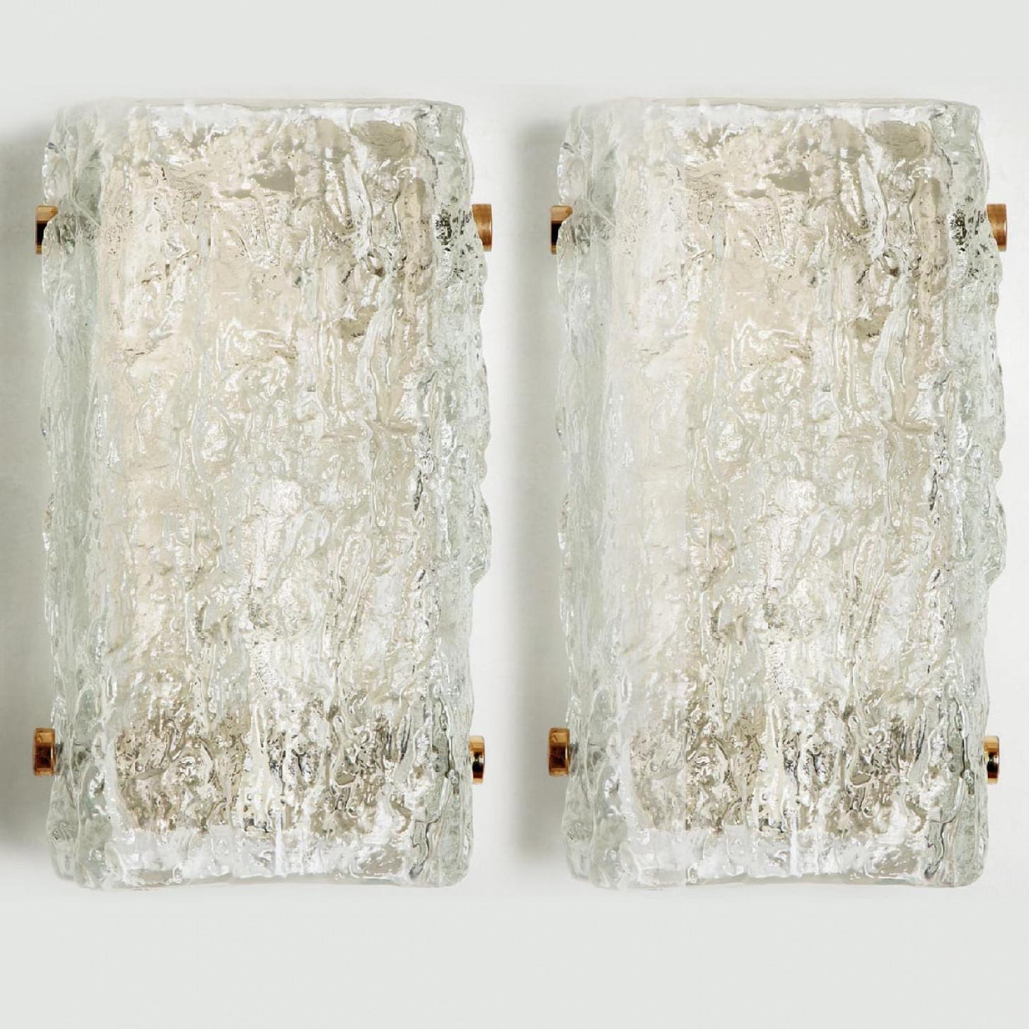 One of the six beautiful high quality light fixture made by Kalmar Leuchten, Germany.

Manufactured in mid century, circa 1960.

This wall light features lights made of handmade ice glass and  off white metal back plate. The sides refract light