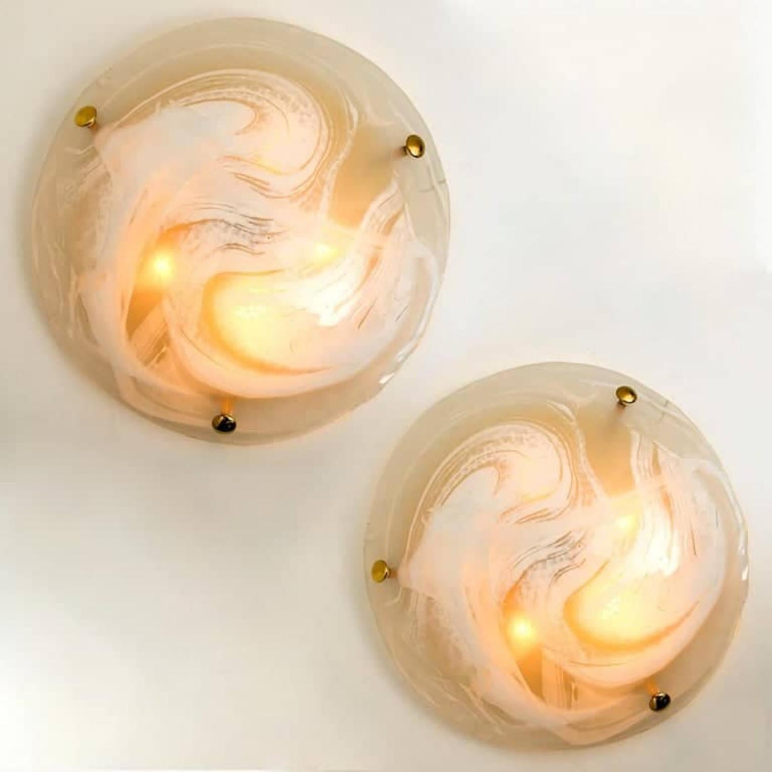 1 of  the 2 high quality modern thick textured ice glass flush mount or wall lights by Hillebrand, circa 1965.

Each light fixture is featuring a huge round blown glass dish. Can work as impressive wall lights but also as flush mounts.

Minimalistic