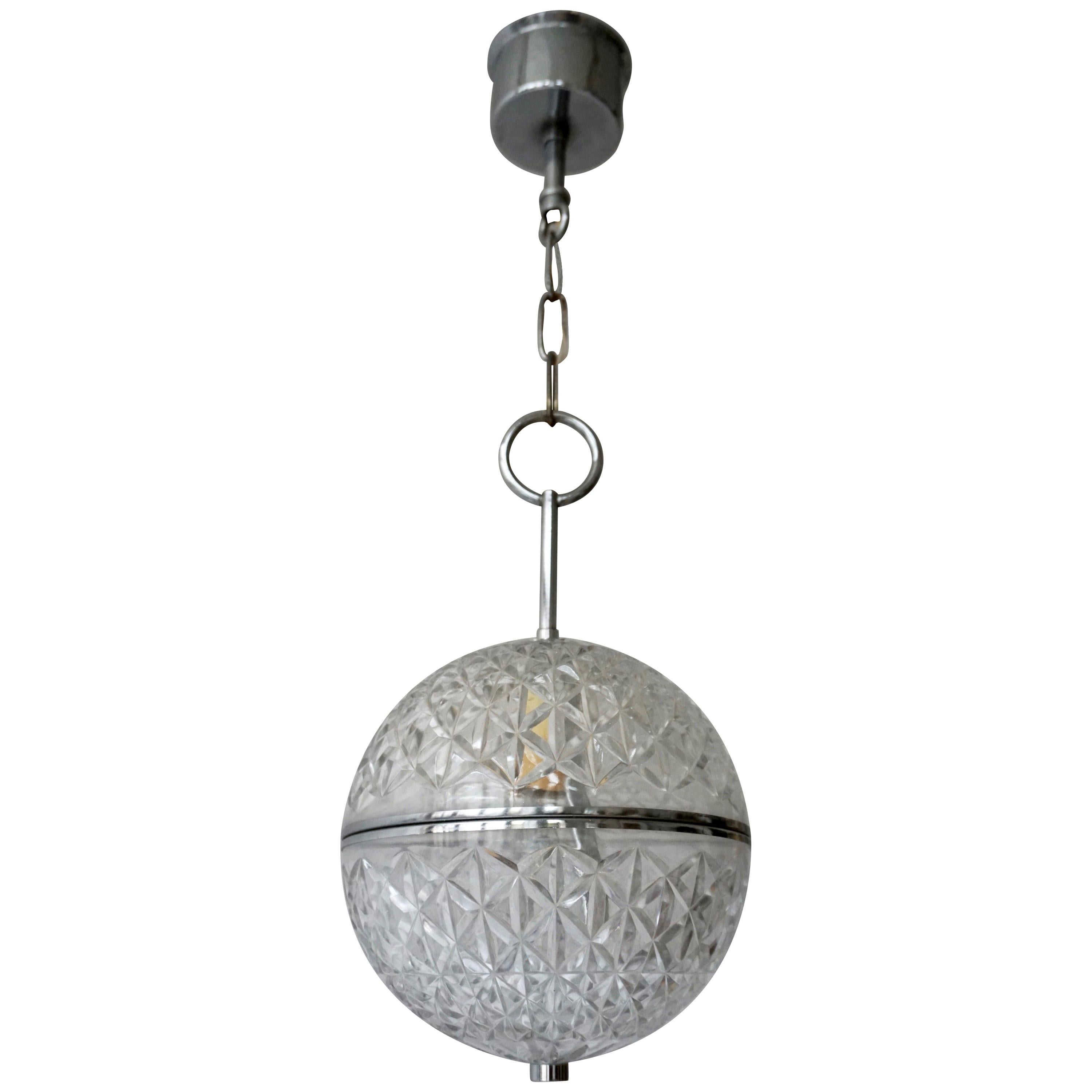 One of Two Crystal Glass and Brass Globe Pendant Lights For Sale