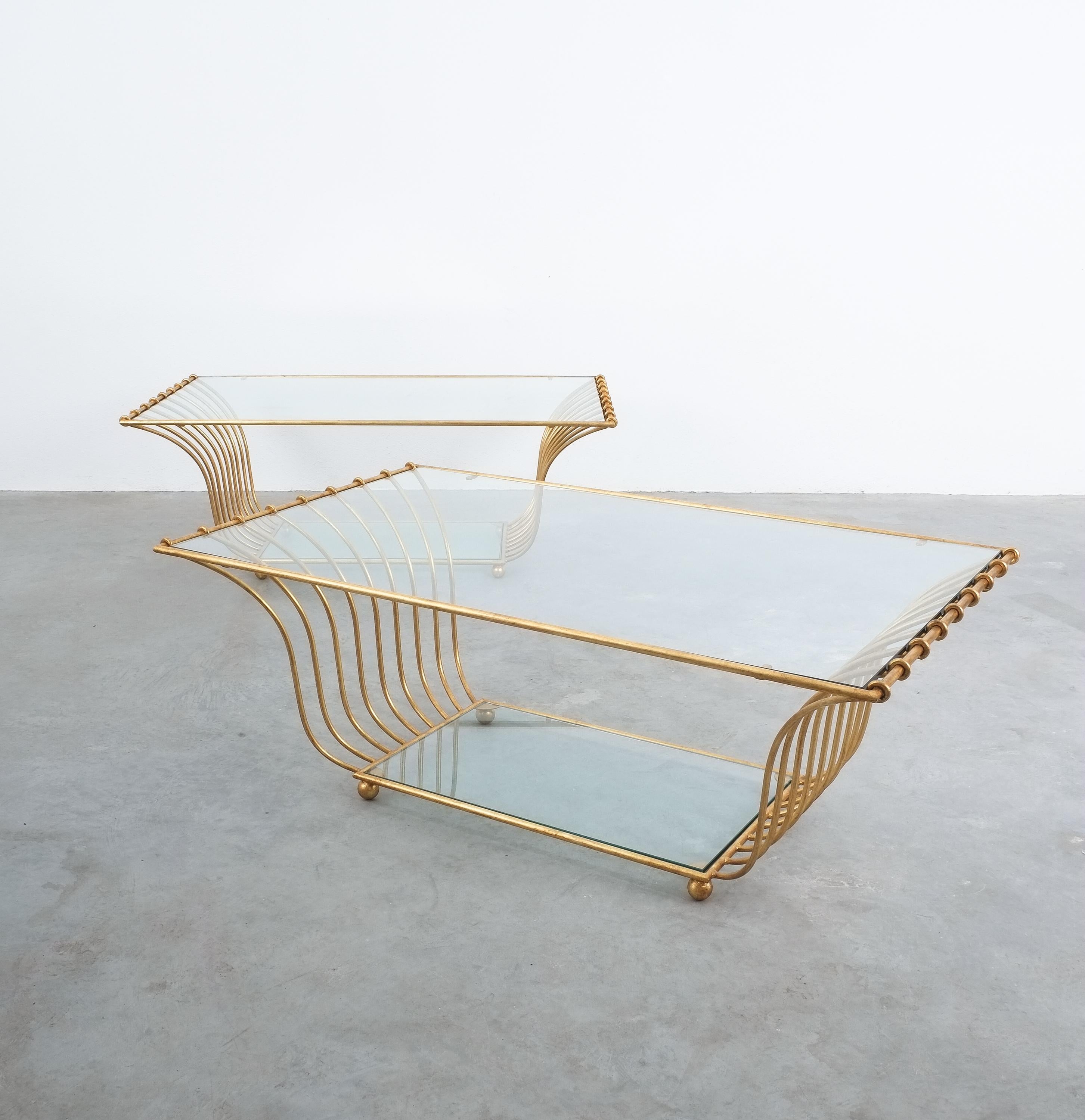 One of two large golden harp coffee tables, France, circa 1955

Sold and priced per piece, individually; Measurements are 50