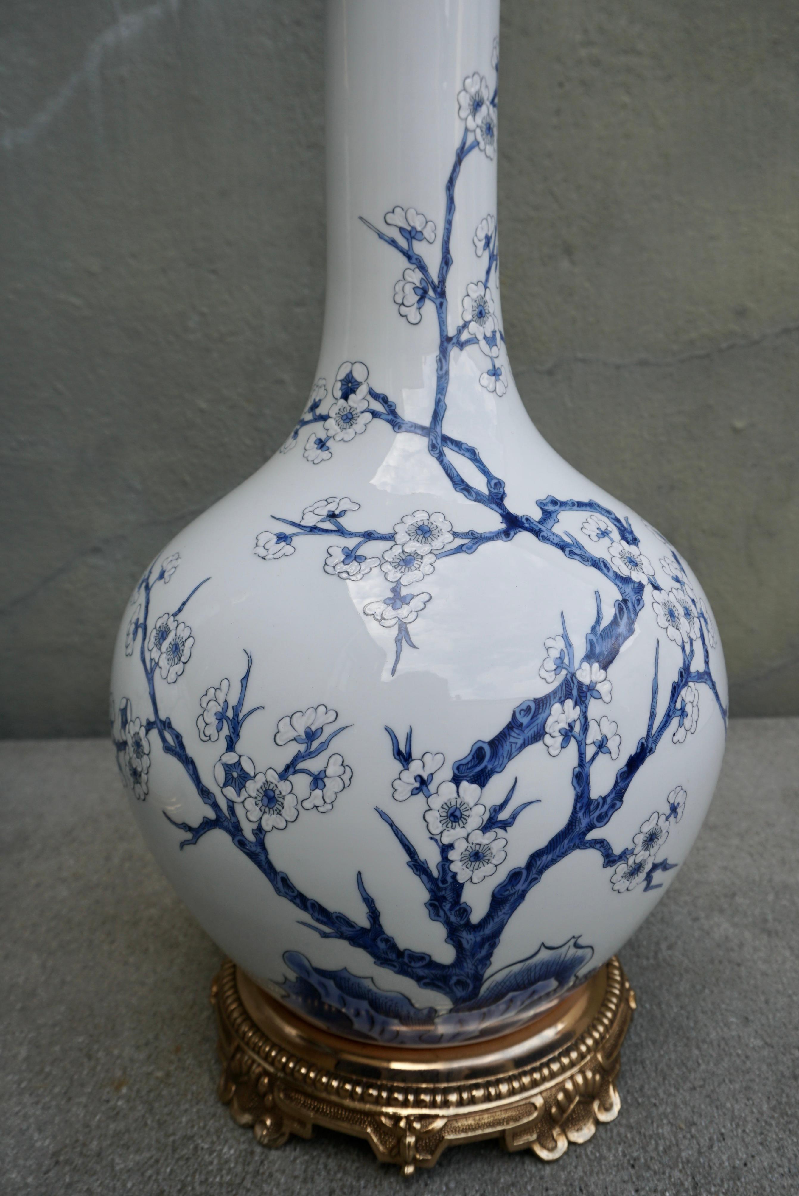 Bronze One of Two Porcelain Paris Blue and White Flower Table Lamps For Sale