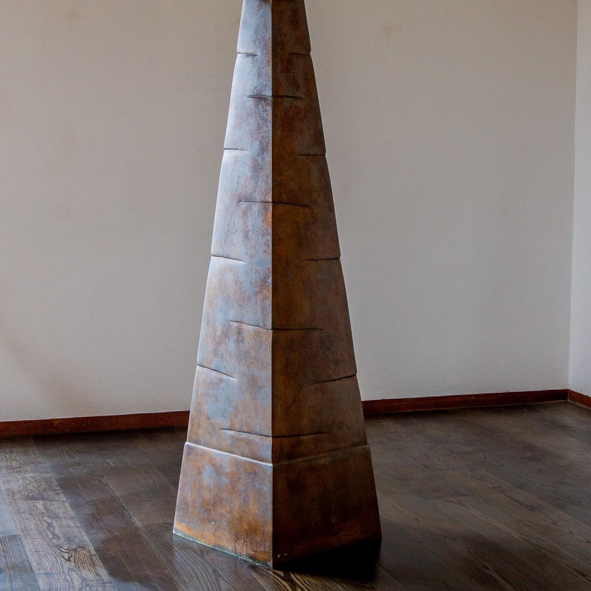 A unique bronze textured obelisk cast by Ken Bolan in 2008. 
The sculpture has a lovely weathered patina.