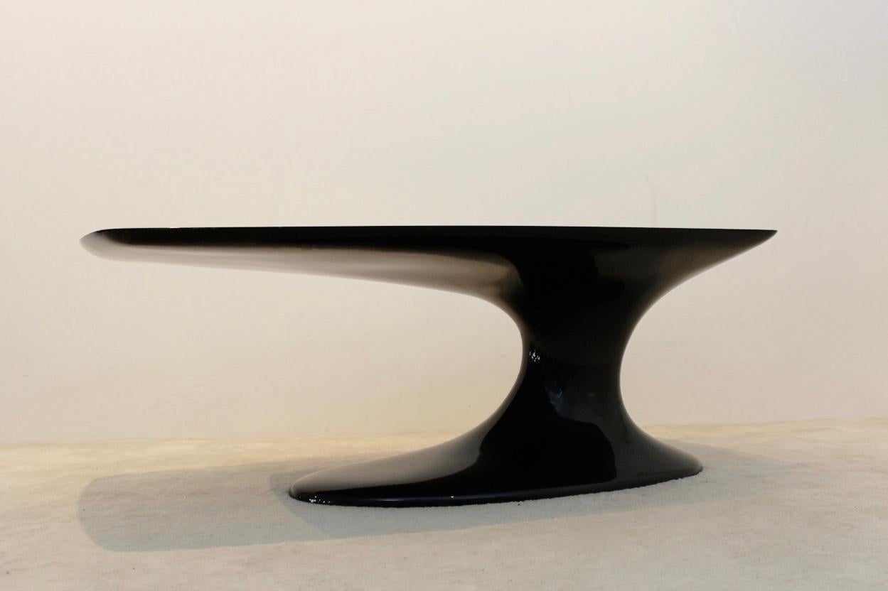 Sophisticated Czech coffee table in black carbon fiber with glamorous performance. Produced by Tunnel/Modelsport in 1999 in the Czech Republic. This table is a one off, as this is the prototype which comes directly from the producers collection. The