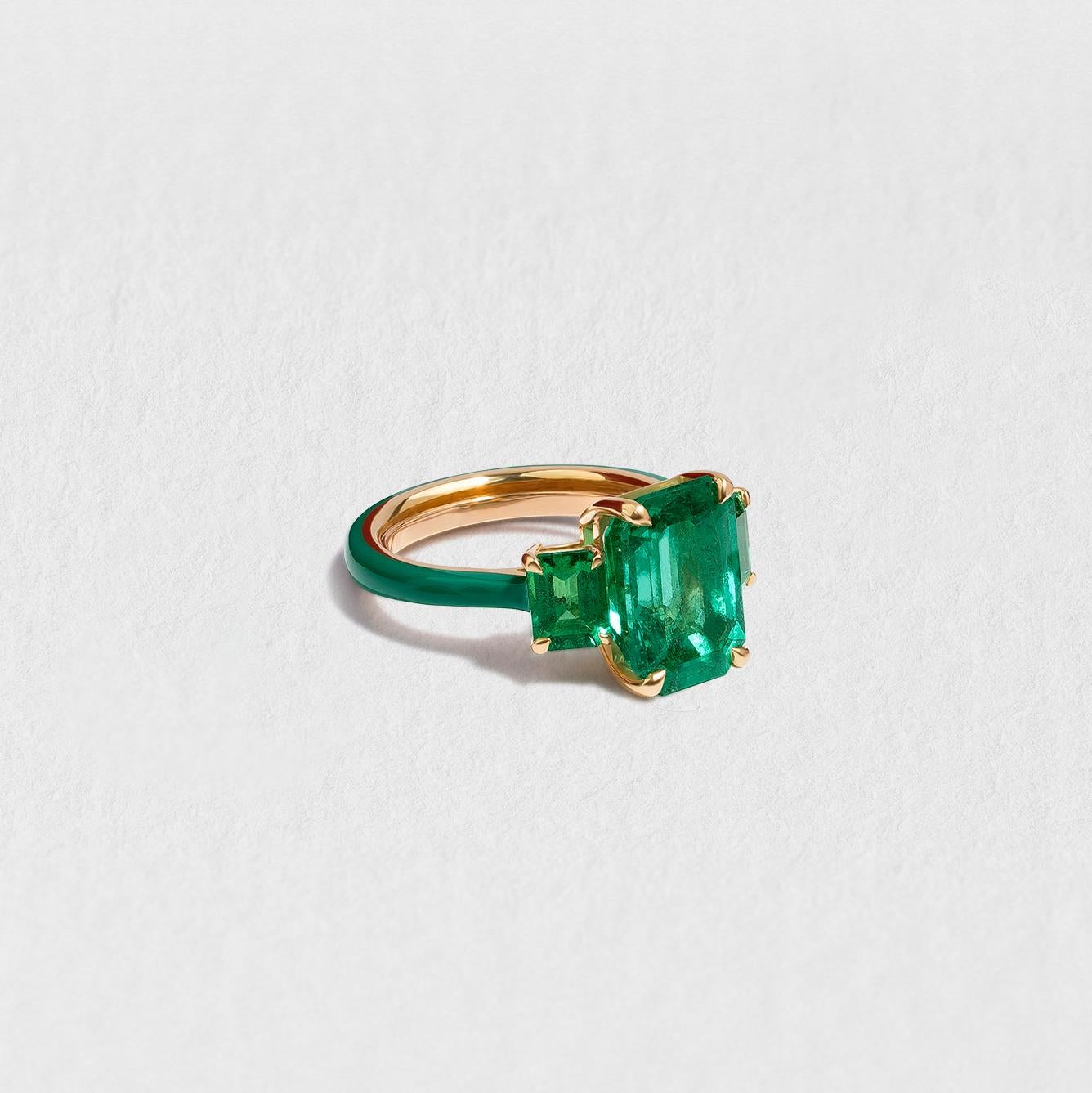 Handmade in our London atelier, this exquisite ring is a true one-off. The largest of its three stones originates from Brazil and is untreated, which is exceptionally rare for an emerald of its clarity and size. The ring’s 18-karat yellow gold band
