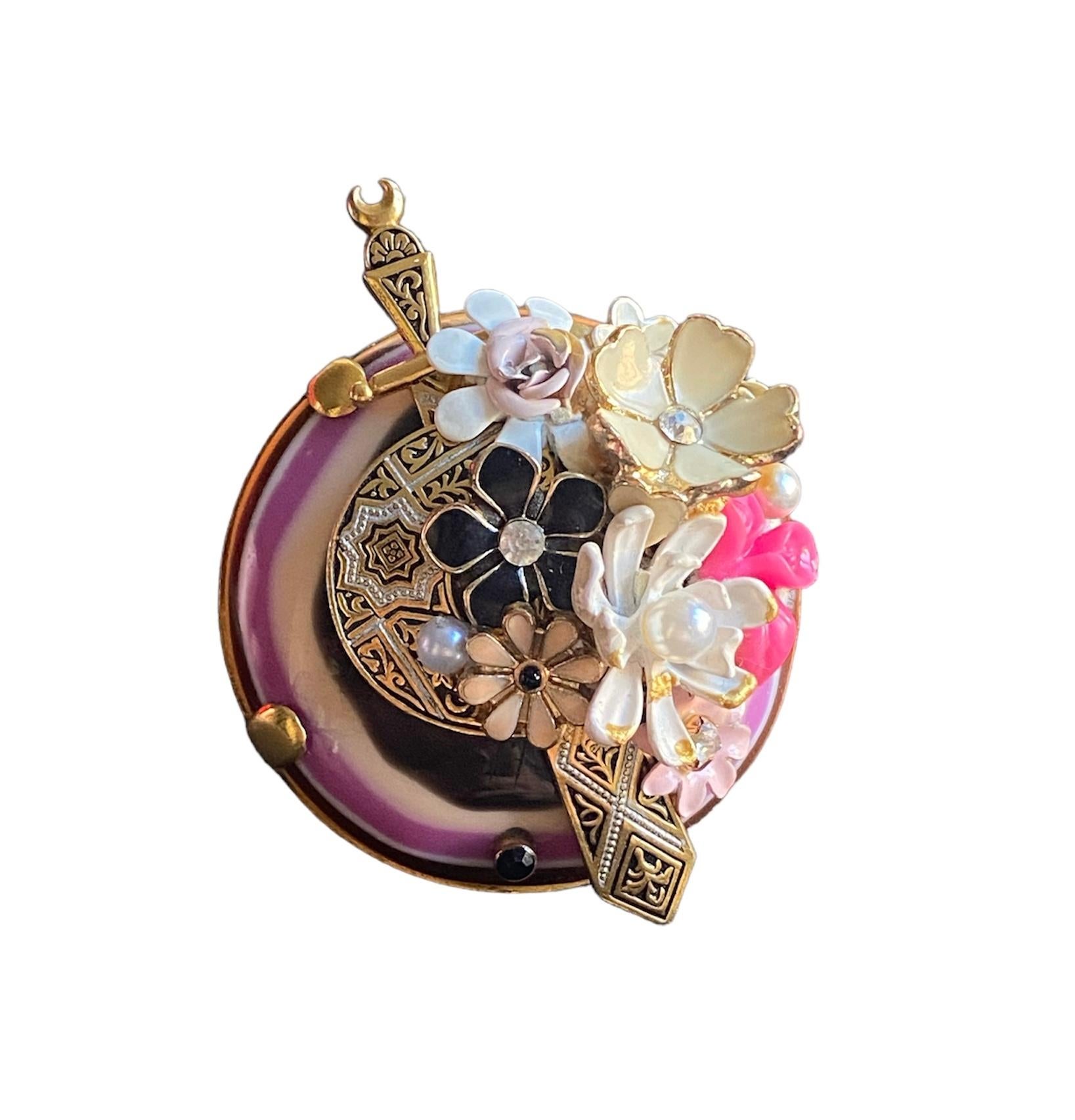 This is a unique piece created for Ludmila Navarro, fine artist & jewellery designer. A totally handmade jewel which it was created from a sustainable process during which she recovers and improves several antique and vintage jewels and elements